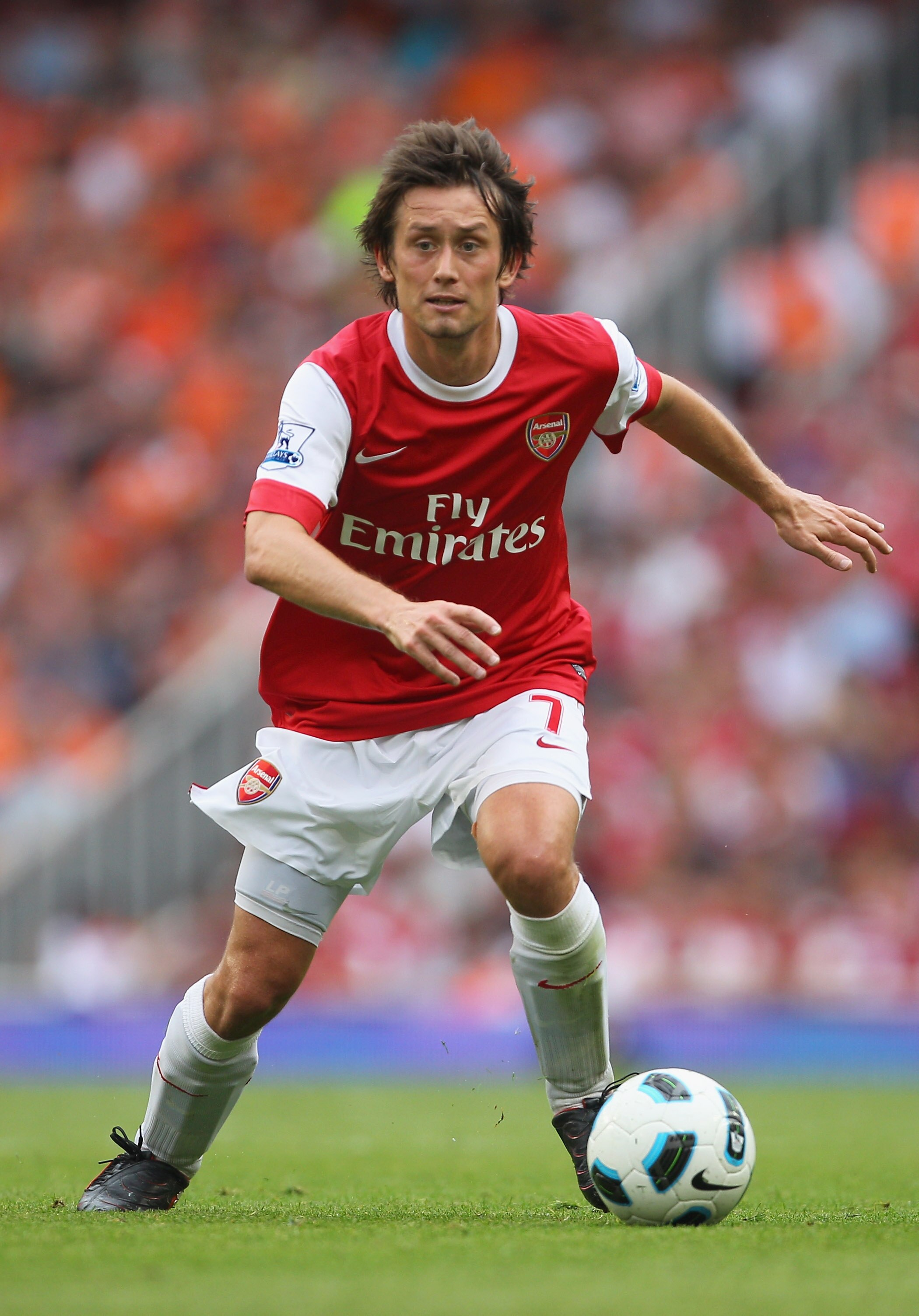LONDON, ENGLAND - AUGUST 21:  Tomas Rosicky of Arsenal in action during the Barclays Premier League match between Arsenal and Blackpool at The Emirates Stadium on August 21, 2010 in London, England.  (Photo by Clive Rose/Getty Images)