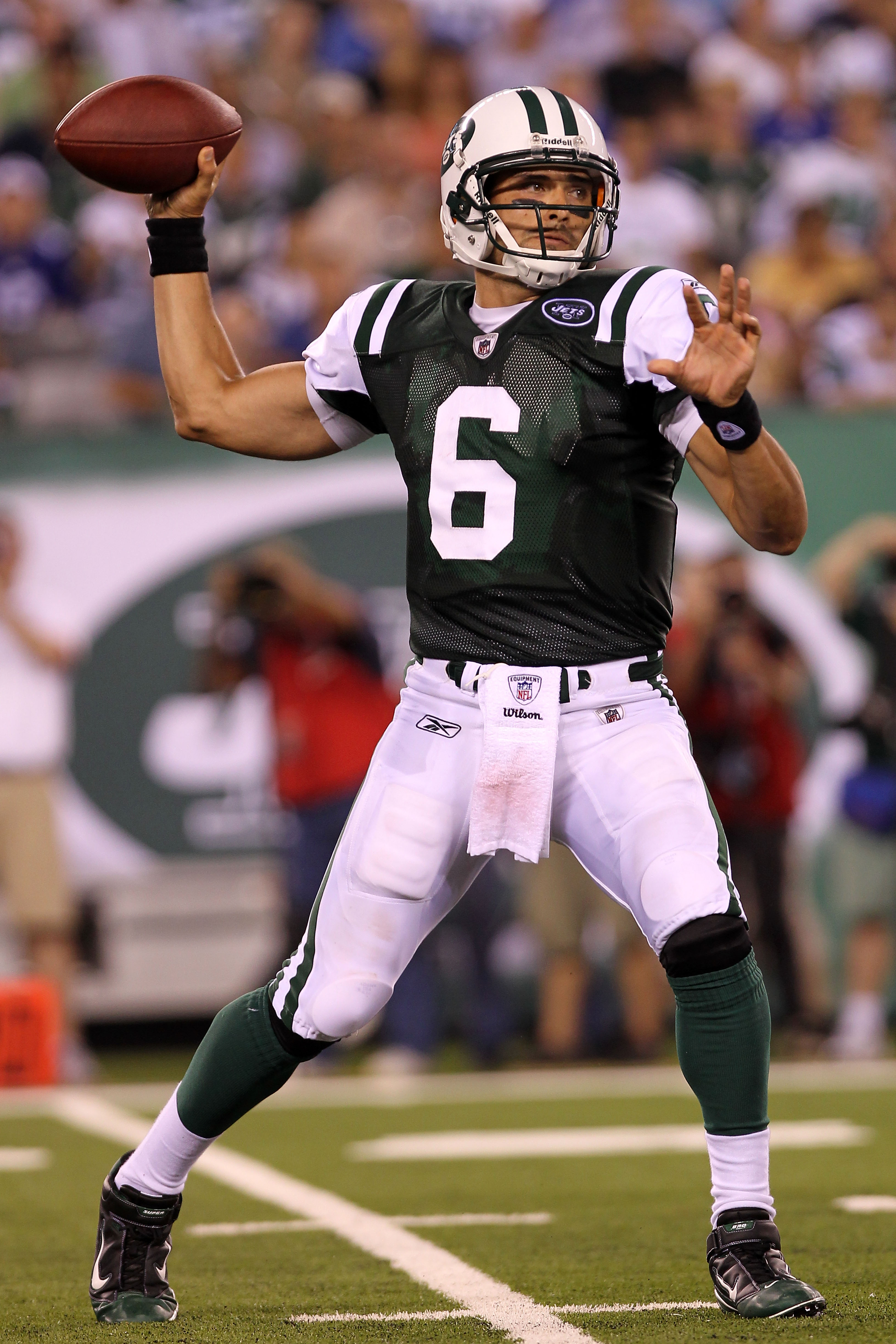 EAST RUTHERFORD, NJ - AUGUST 16:  Quarterback Mark Sanchez #6 of the New York Jets passes against the New York Giants during their game at New Meadowlands Stadium on August 16, 2010 in East Rutherford, New Jersey.  (Photo by Nick Laham/Getty Images)