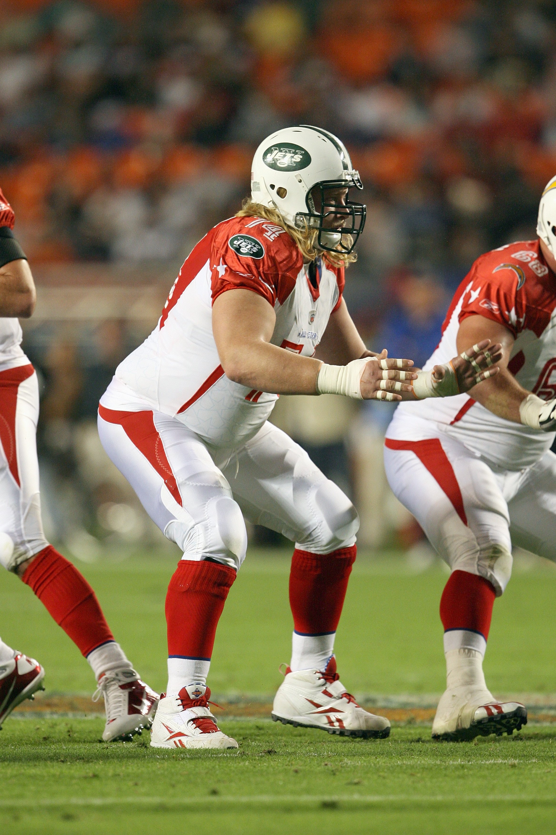 MIAMI GARDENS, FL - JANUARY 31:  Nick Mangold #74 of the New York Jets moves off the line during the 2010 AFC-NFC Pro Bowl at Sun Life Stadium on January 31, 2010 in Miami Gardens, Florida. (Photo by Doug Benc/Getty Images)