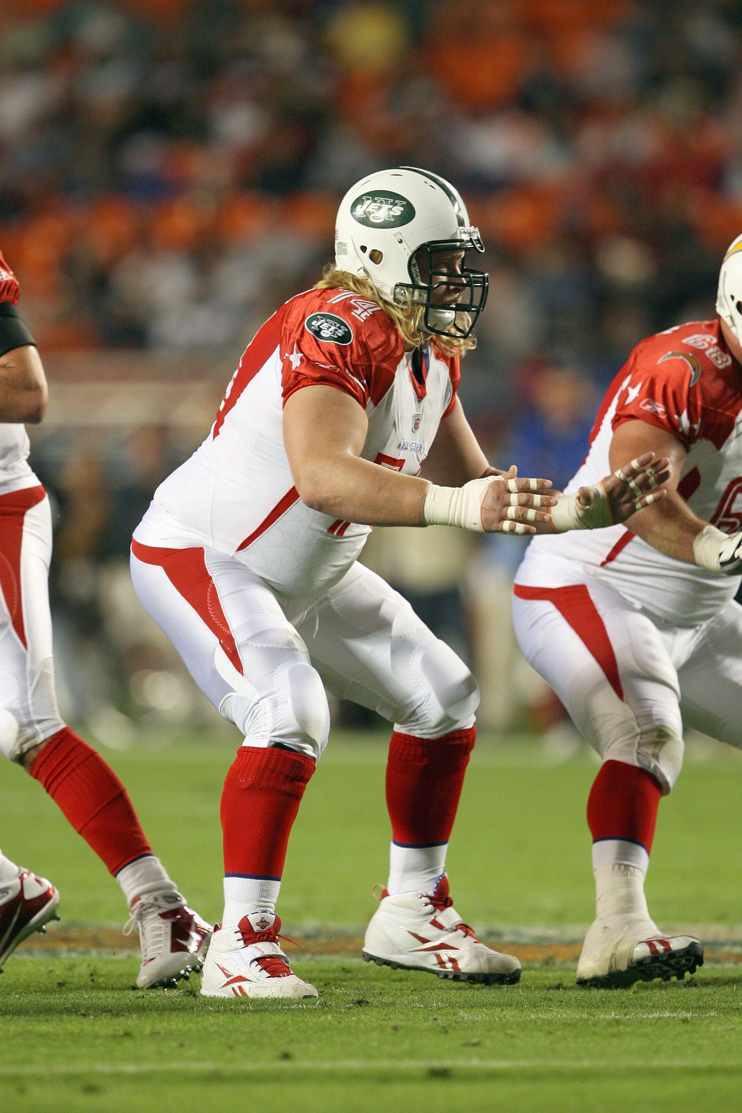 MIAMI GARDENS, FL - JANUARY 31: Nick Mangold #74 of the New York Jets moves off the line during the 2010 AFC-NFC Pro Bowl at Sun Life Stadium on January 31, 2010 in Miami Gardens, Florida. (Photo by Doug Benc/Getty Images) MIAMI GARDENS, FL - JANUARY 31: Nick Mangold #74 of the New York Jets moves off the line during the 2010 AFC-NFC Pro Bowl at Sun Life Stadium on January 31, 2010 in Miami Gardens, Florida. (Photo by Doug Benc/Getty Images)