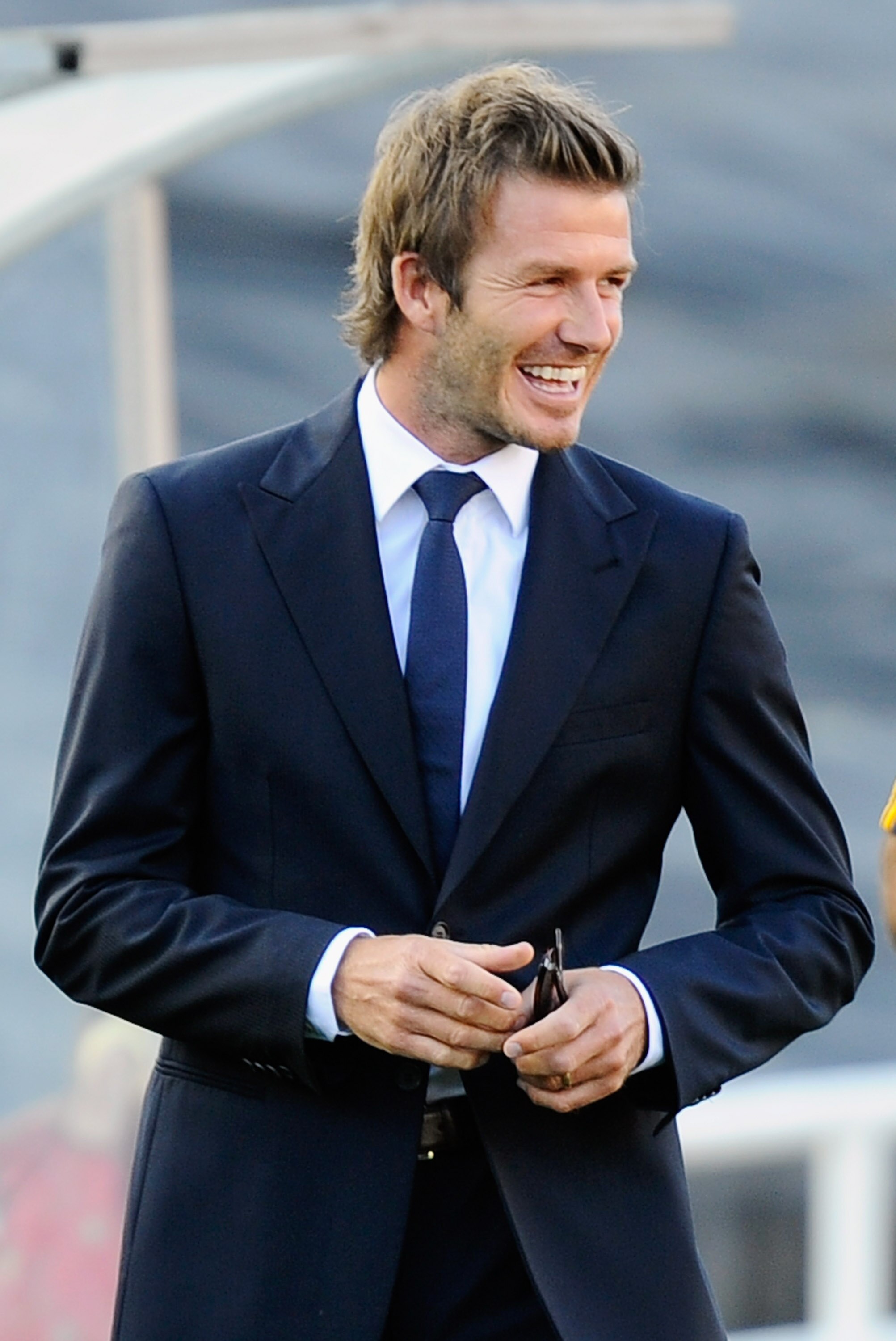 PASADENA, CA - AUGUST 07: David Beckham of Los Angeles Galaxy visits Real Madrid becnh before the start of their pre-season friendly soccer match on August 7, 2010 at the Rose Bowl in Pasadena, California. Real Madrid will travel back to Spain after the s PASADENA, CA - AUGUST 07: David Beckham of Los Angeles Galaxy visits Real Madrid becnh before the start of their pre-season friendly soccer match on August 7, 2010 at the Rose Bowl in Pasadena, California. Real Madrid will travel back to Spain after the s