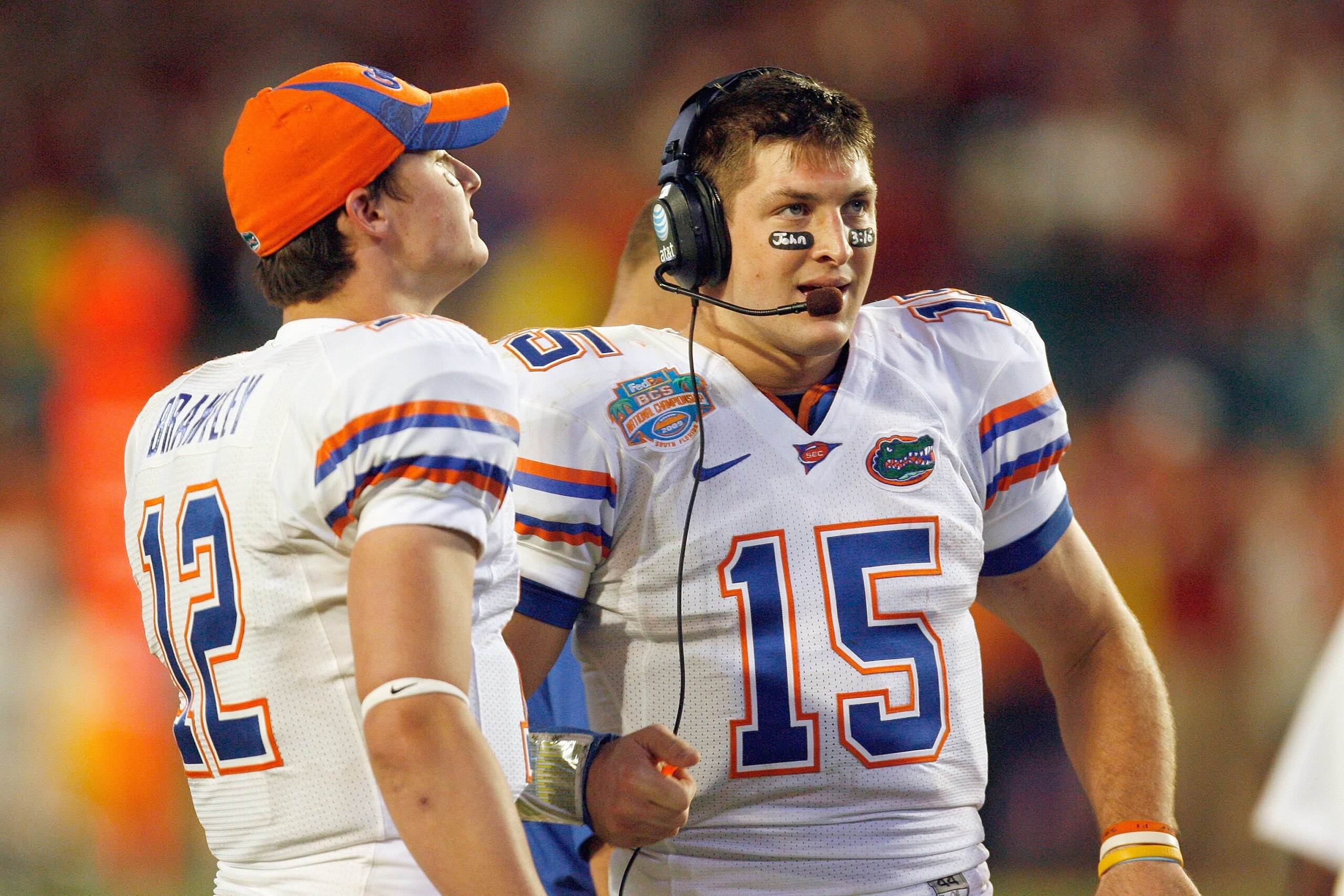 MIAMI - JANUARY 08: Quarterback Tim Tebow #15 of the Florida Gators listens to the coaches with John Brantley #12 against the Oklahoma Sooners during the FedEx BCS National Championship Game at Dolphin Stadium on January 8, 2009 in Miami, Florida. (Phot MIAMI - JANUARY 08: Quarterback Tim Tebow #15 of the Florida Gators listens to the coaches with John Brantley #12 against the Oklahoma Sooners during the FedEx BCS National Championship Game at Dolphin Stadium on January 8, 2009 in Miami, Florida. (Phot