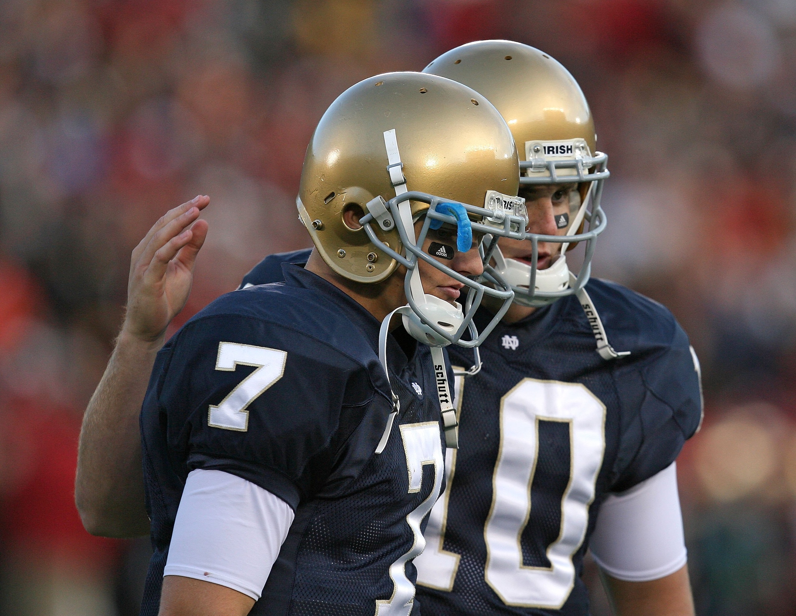 SOUTH BEND, IN - OCTOBER 17: Jimmy Clausen #7 of the Notre Dame Fighting Irish is consoled by teammate Dayne Crist #10 during a game against the USC Trojans at Notre Dame Stadium on October 17, 2009 in South Bend, Indiana. USC defeated Notre Dame 34-27. ( SOUTH BEND, IN - OCTOBER 17: Jimmy Clausen #7 of the Notre Dame Fighting Irish is consoled by teammate Dayne Crist #10 during a game against the USC Trojans at Notre Dame Stadium on October 17, 2009 in South Bend, Indiana. USC defeated Notre Dame 34-27. (