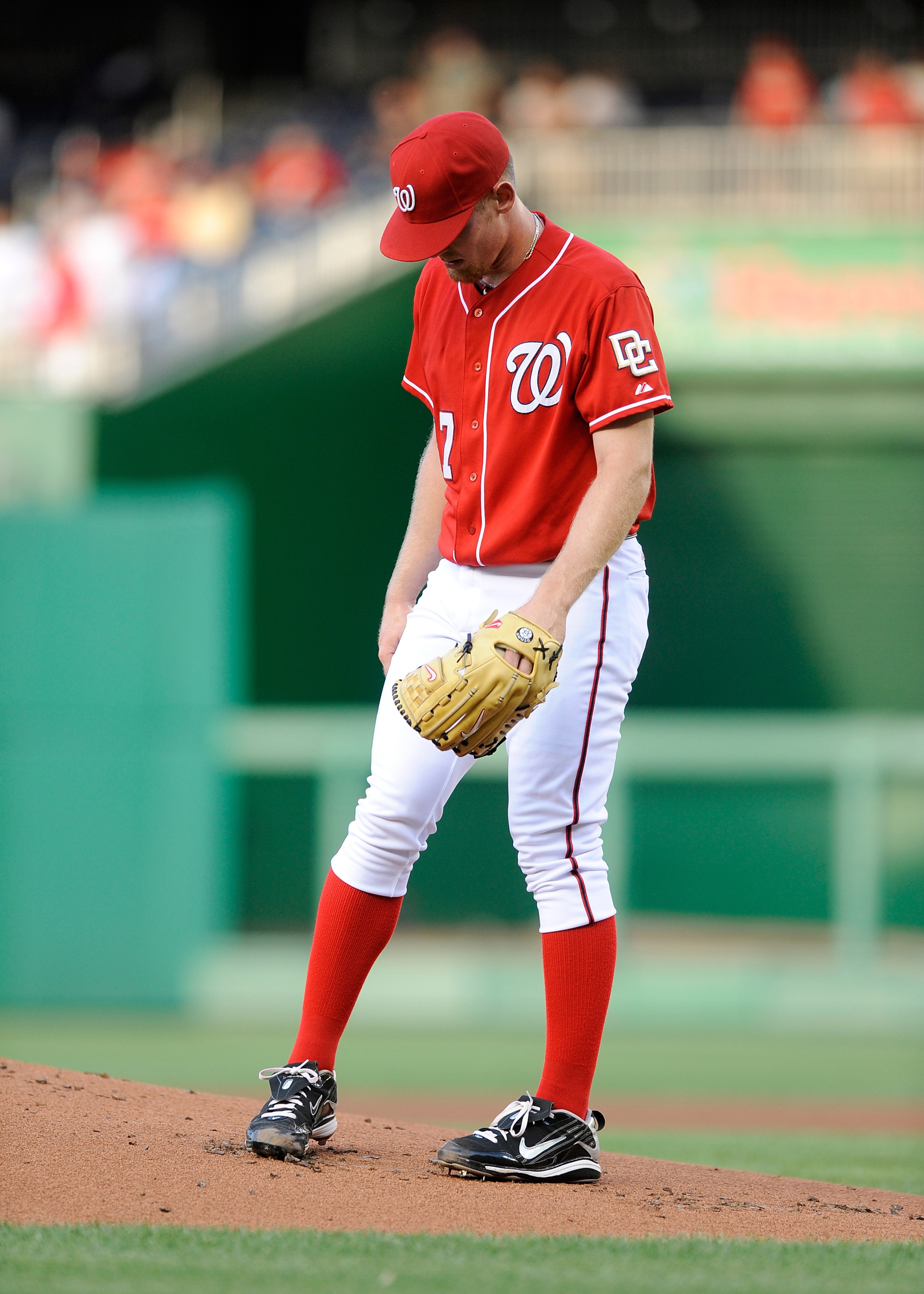 WASHINGTON - JULY 09:  Stephen Strasburg #37 of the Washington Nationals reacts after giving up a home run during the first inning against the San Francisco Giants at Nationals Park on July 9, 2010 in Washington, DC.  (Photo by Greg Fiume/Getty Images)