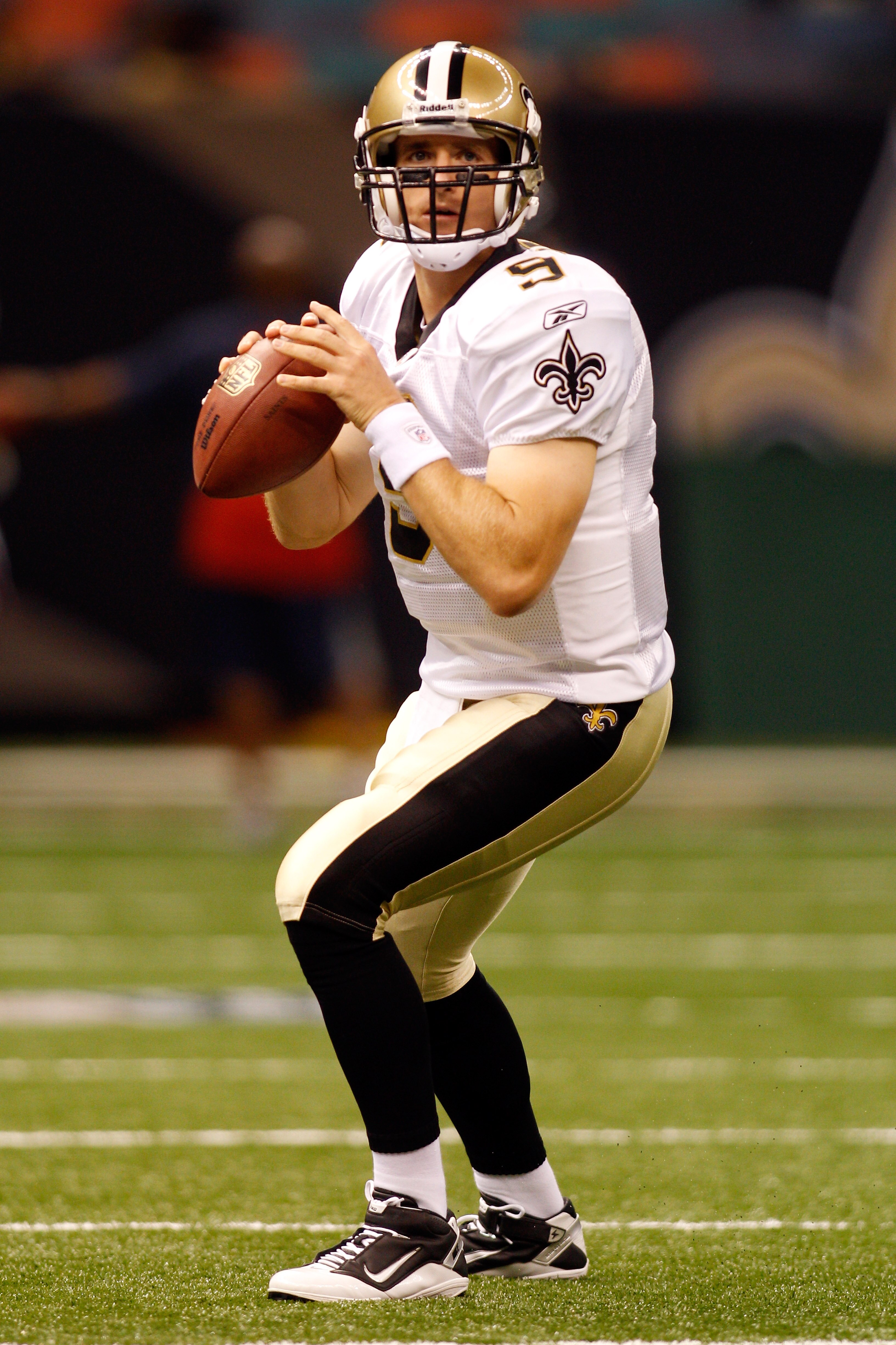 NEW ORLEANS - AUGUST 21:  Quarterback Drew Brees #9 of the New Orleans Saints warms up during pregame before playing the Houston Texans at the Louisiana Superdome on August 21, 2010 in New Orleans, Louisiana.  (Photo by Chris Graythen/Getty Images)