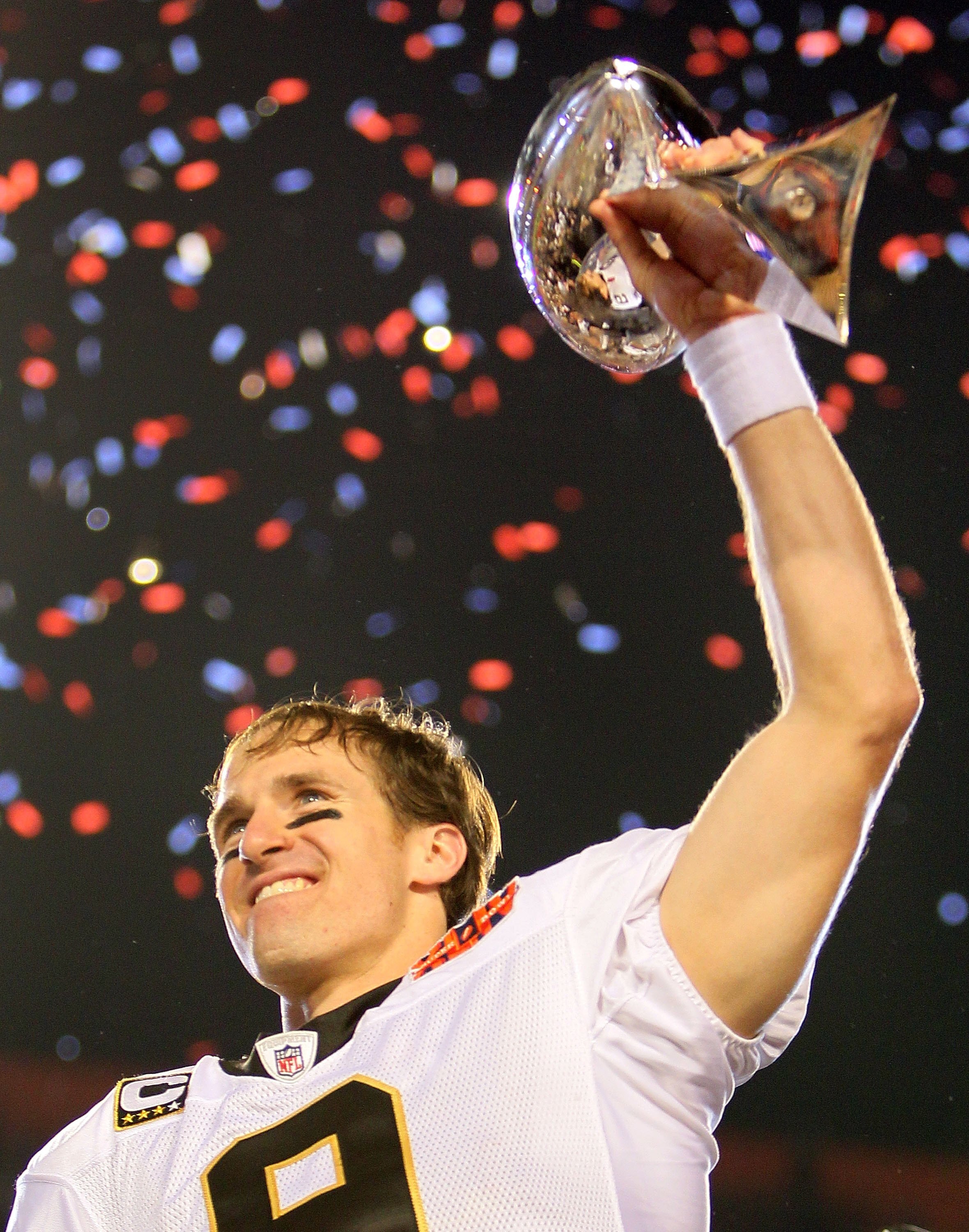 MIAMI GARDENS, FL - FEBRUARY 07:  Quarterback Drew Brees #9 of the New Orleans Saints celebrates after his team defeated the Indianapolis Colts during Super Bowl XLIV on February 7, 2010 at Sun Life Stadium in Miami Gardens, Florida.  (Photo by Andy Lyons