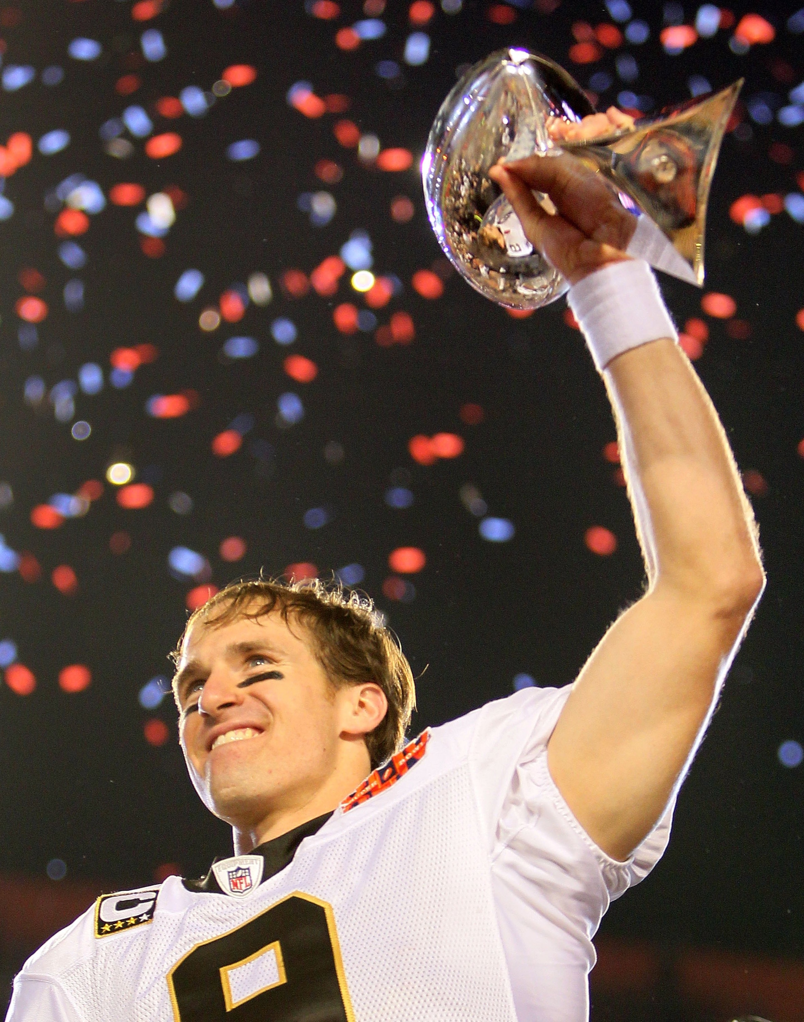 MIAMI GARDENS, FL - FEBRUARY 07:  Quarterback Drew Brees #9 of the New Orleans Saints celebrates after his team defeated the Indianapolis Colts during Super Bowl XLIV on February 7, 2010 at Sun Life Stadium in Miami Gardens, Florida.  (Photo by Andy Lyons