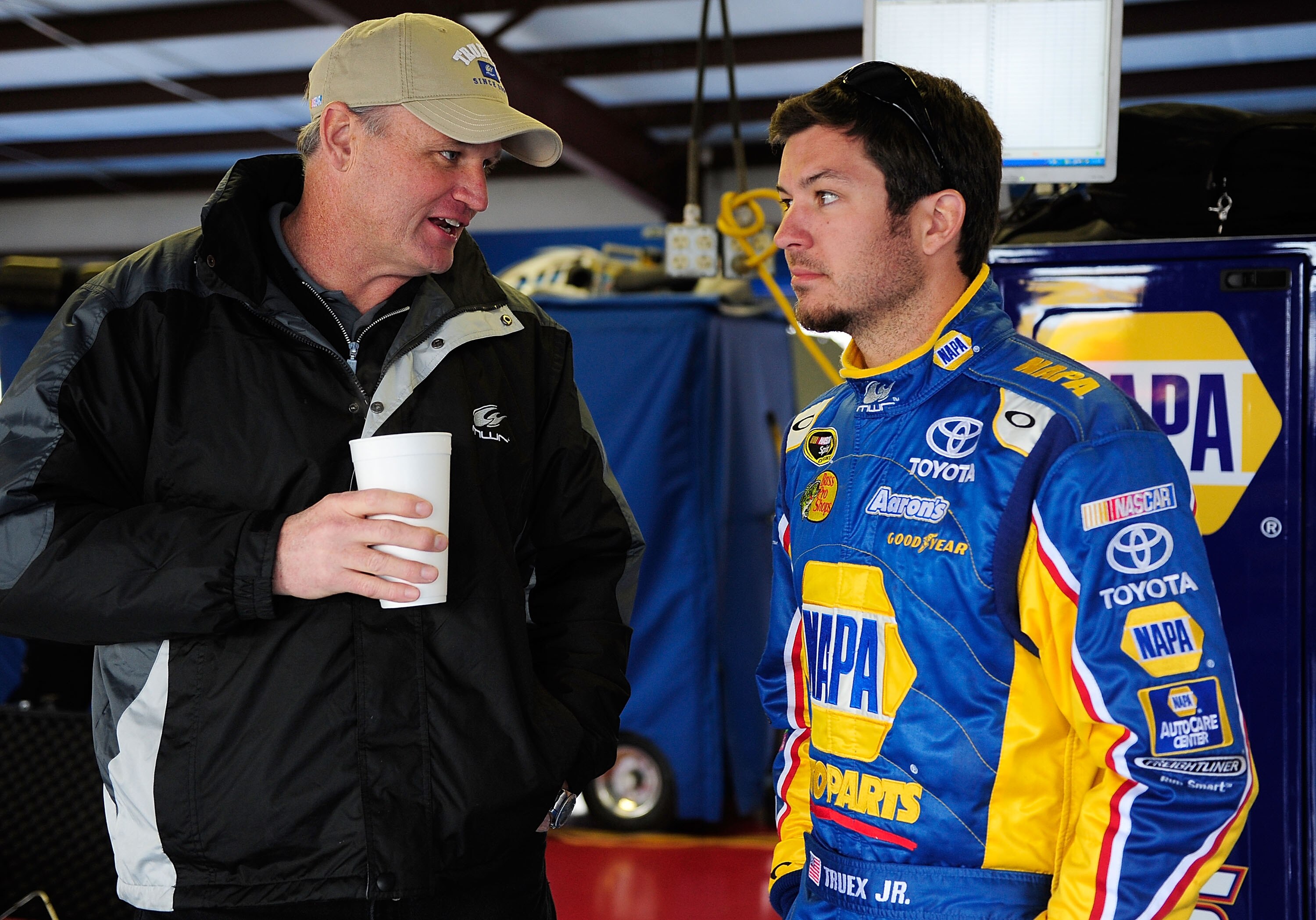 TALLADEGA, AL - MARCH 16:  Pat Tryson speaks with Martin Truex Jr., driver of the #56 NAPA Toyota in the garage during testing for the NASCAR Sprint Cup Series at Talladega Superspeedway on March 16, 2010 in Talladega, Alabama.  (Photo by Rusty Jarrett/Ge