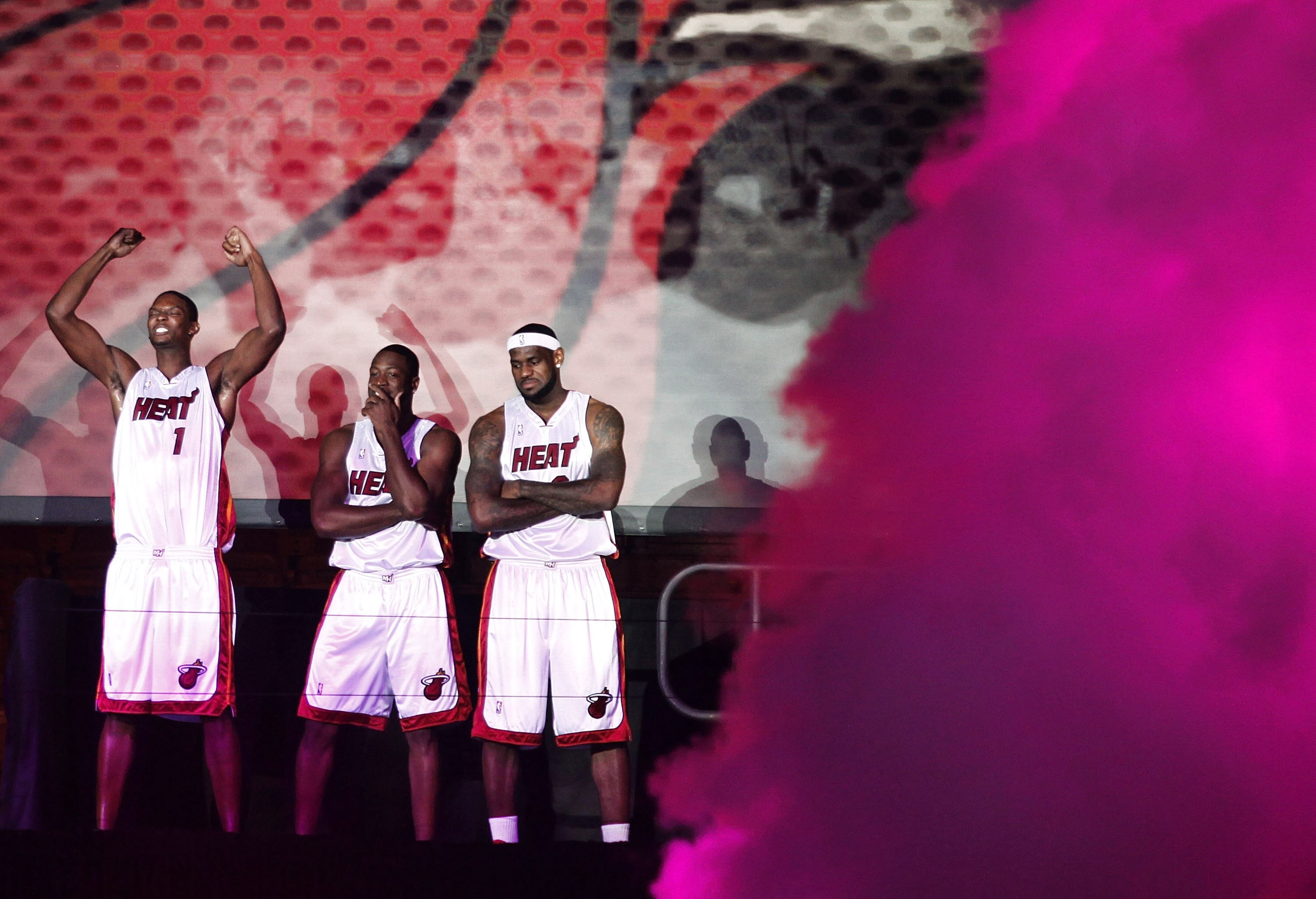 MIAMI - JULY 09:  (L-R) Chris Bosh #1, Dwyane Wade #3, and LeBron James #6 of the Miami Heat are introduced during a welcome party at American Airlines Arena on July 9, 2010 in Miami, Florida.  (Photo by Marc Serota/Getty Images)