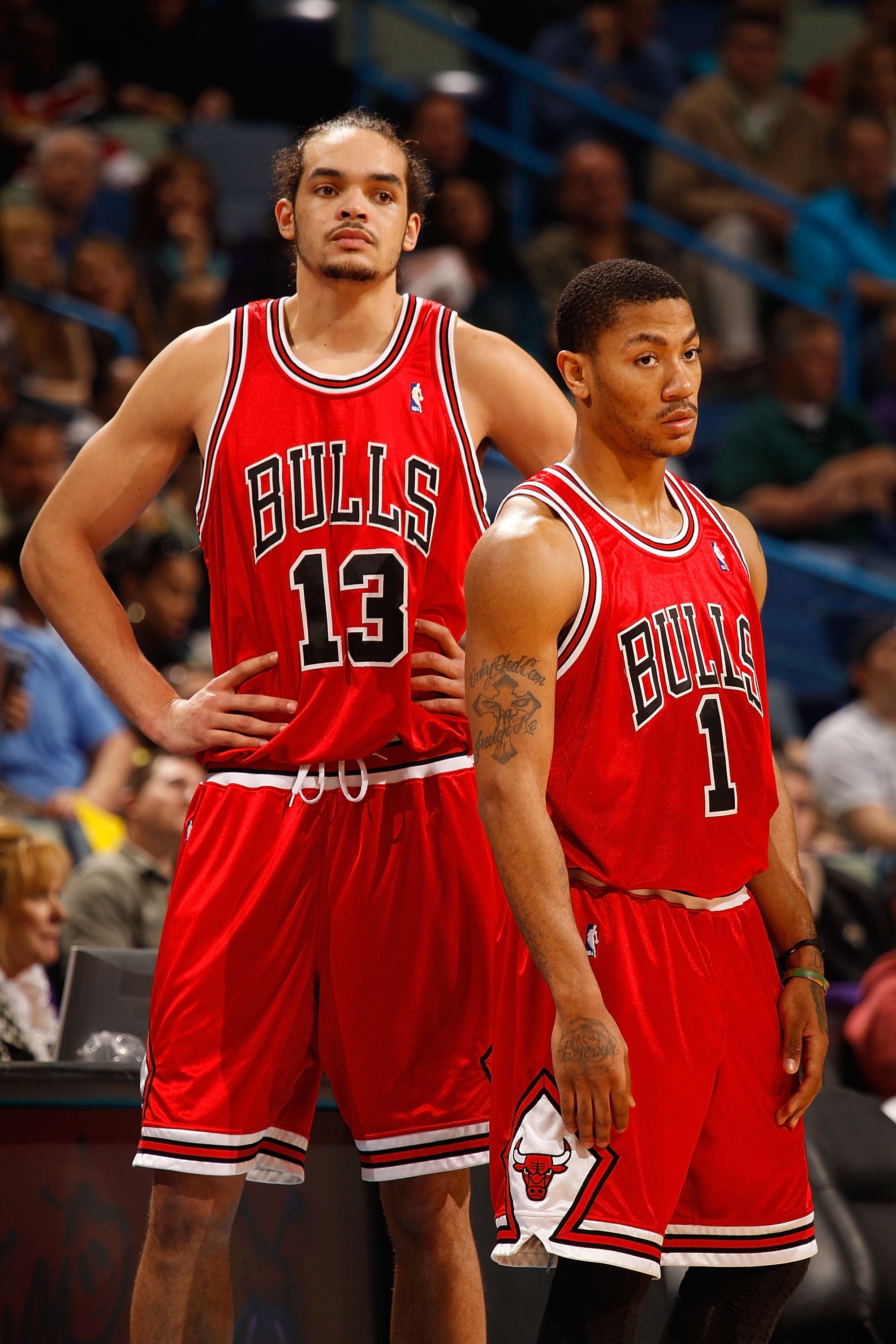 NEW ORLEANS - JANUARY 29:  Joakim Noah #13 and Derrick Rose #1 of the Chicago Bulls during the game against the New Orleans Hornets at the New Orleans Arena on January 29, 2010 in New Orleans, Louisiana.   NOTE TO USER: User expressly acknowledges and agr