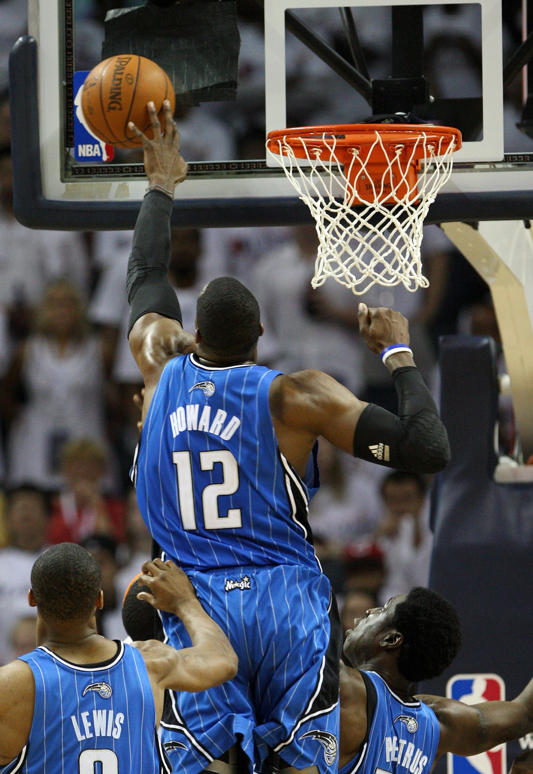 CHARLOTTE - APRIL 24:  Center Dwight Howard #12 of the Orlando Magic blocks a shot during Game Three of the Eastern Conference Quarterfinals against the Charlotte Bobcats during the 2010 NBA Playoffs at Time Warner Cable Arena on April 24, 2010 in Charlot