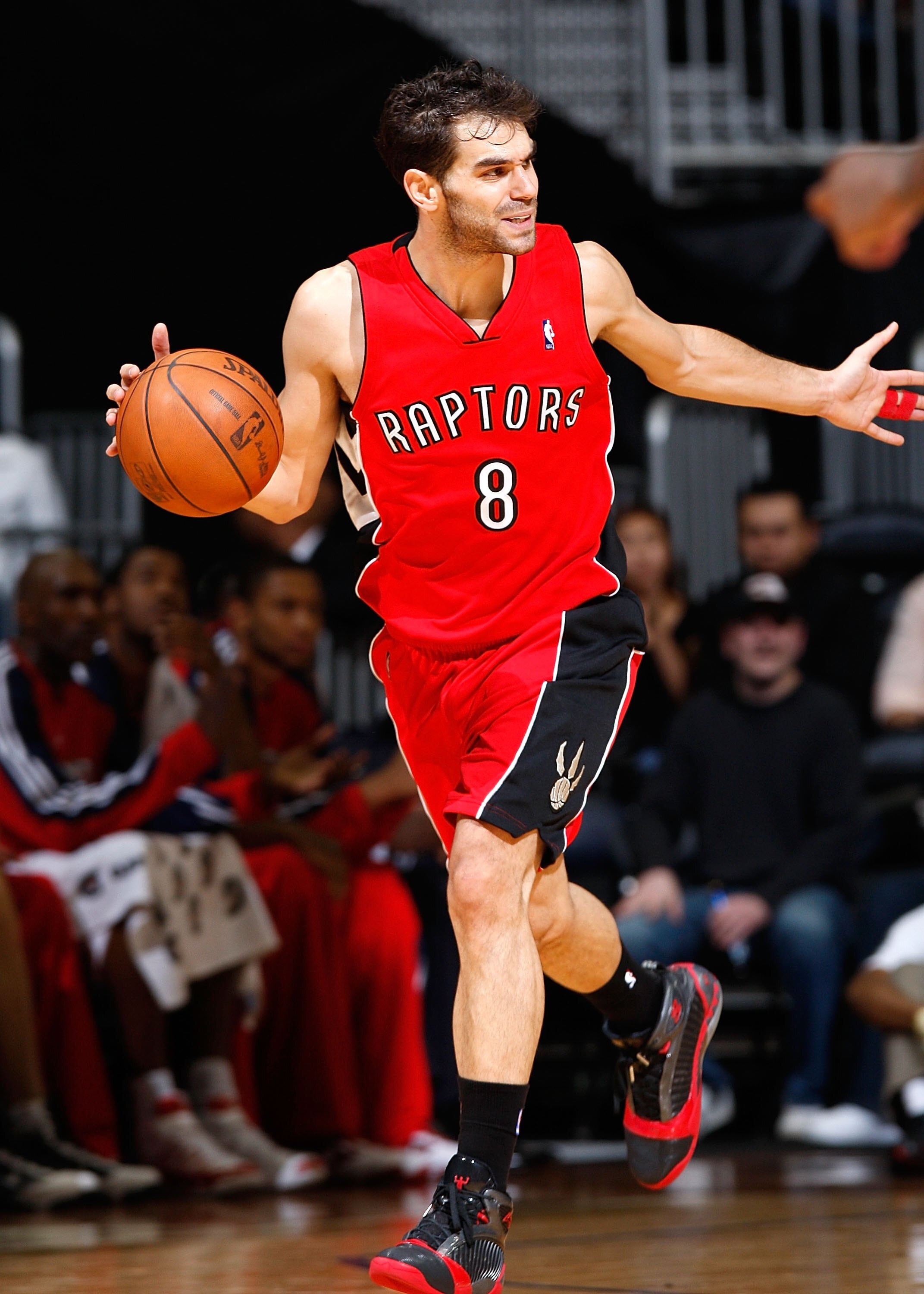 ATLANTA - DECEMBER 02:  Jose Calderon #8 of the Toronto Raptors against the Atlanta Hawks at Philips Arena on December 2, 2009 in Atlanta, Georgia.  NOTE TO USER: User expressly acknowledges and agrees that, by downloading and/or using this Photograph, Us