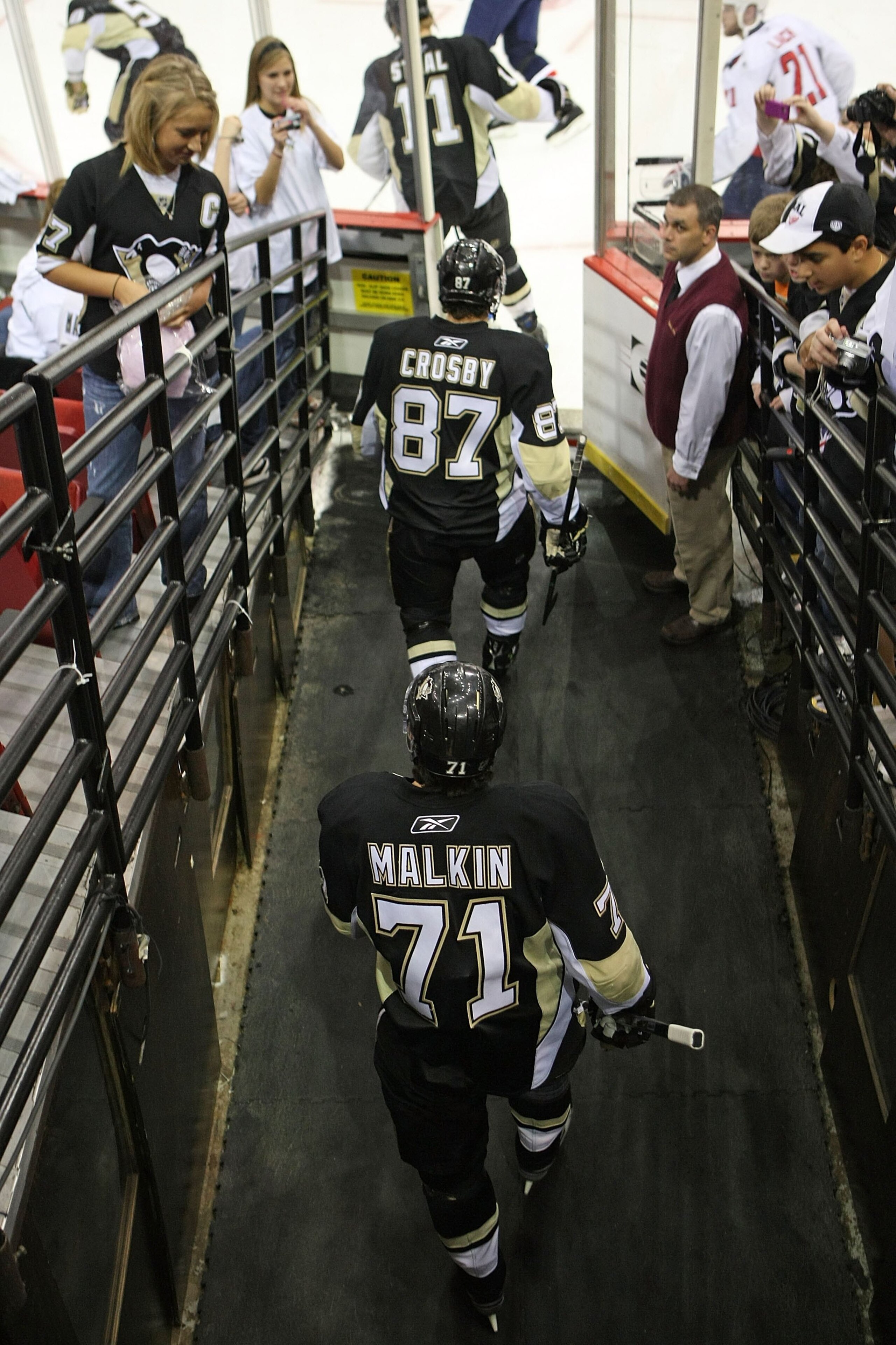 PITTSBURGH - MAY 11:  Sidney Crosby #87 and Evgeni Malkin #71 of the Pittsburgh Penguins skate out for warmups prior to their game against the Washington Capitals in Game Six of the Eastern Conference Semifinal Round of the 2009 Stanley Cup Playoffs at Me