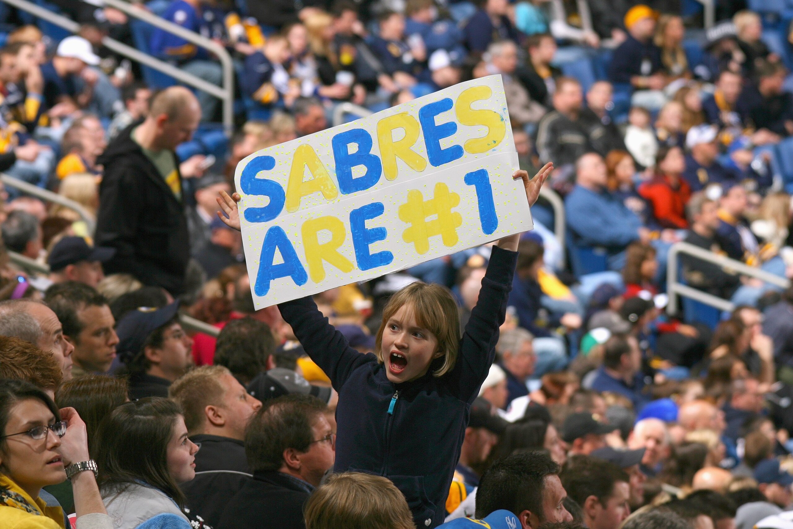 BUFFALO, NY - MARCH 12: A young fan of the Buffalo Sabres holds up a #1 sign during the game against the Minnesota Wild at HSBC Arena on March 12, 2010 in Buffalo, New York. (Photo by Rick Stewart/Getty Images)