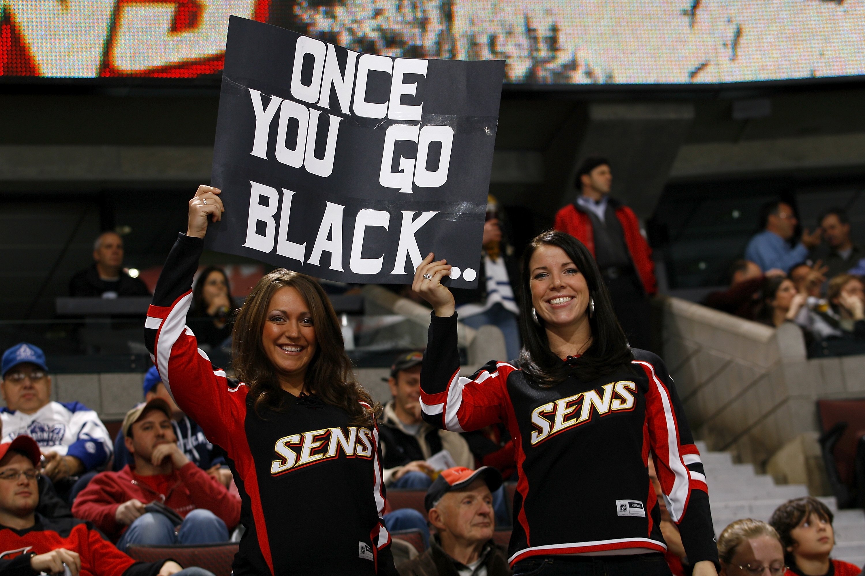 OTTAWA - NOVEMBER 27:  Fans of the Ottawa Senators hold up a sign, on which reads 'Once you go Black...', in a show support for their team during the NHL game between the Toronto Maple Leafs and the Ottawa Senators on November 27, 2008 at the Scotiabank P