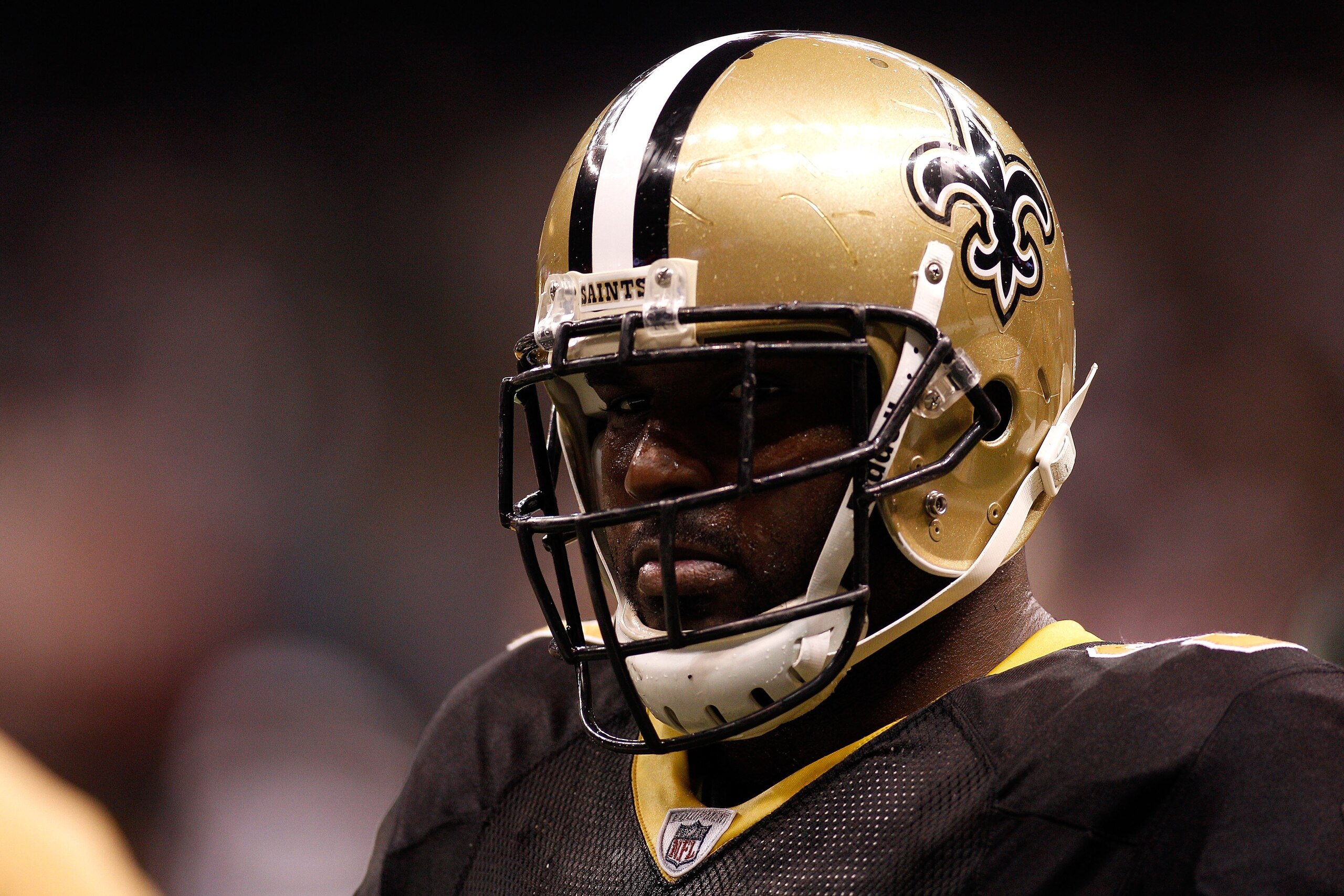 NEW ORLEANS - JANUARY 24:  Sedrick Ellis #98 of the New Orleans Saints looks on against the Minnesota Vikings during the NFC Championship Game at the Louisiana Superdome on January 24, 2010 in New Orleans, Louisiana. The Saints won 31-28 in overtime.  (Ph