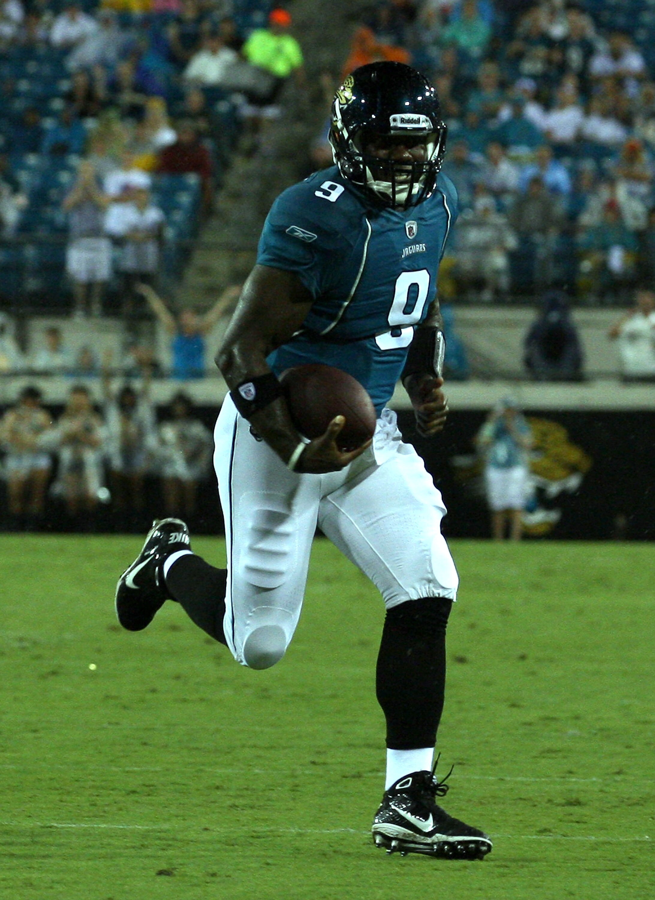 JACKSONVILLE, FL - AUGUST 21:  Quarterback David Garrard #9 of the Jacksonville Jaguars runs for yardage during the preseason game against the Miami Dolphins at EverBank Field on August 21, 2010 in Jacksonville, Florida.  (Photo by Sam Greenwood/Getty Ima