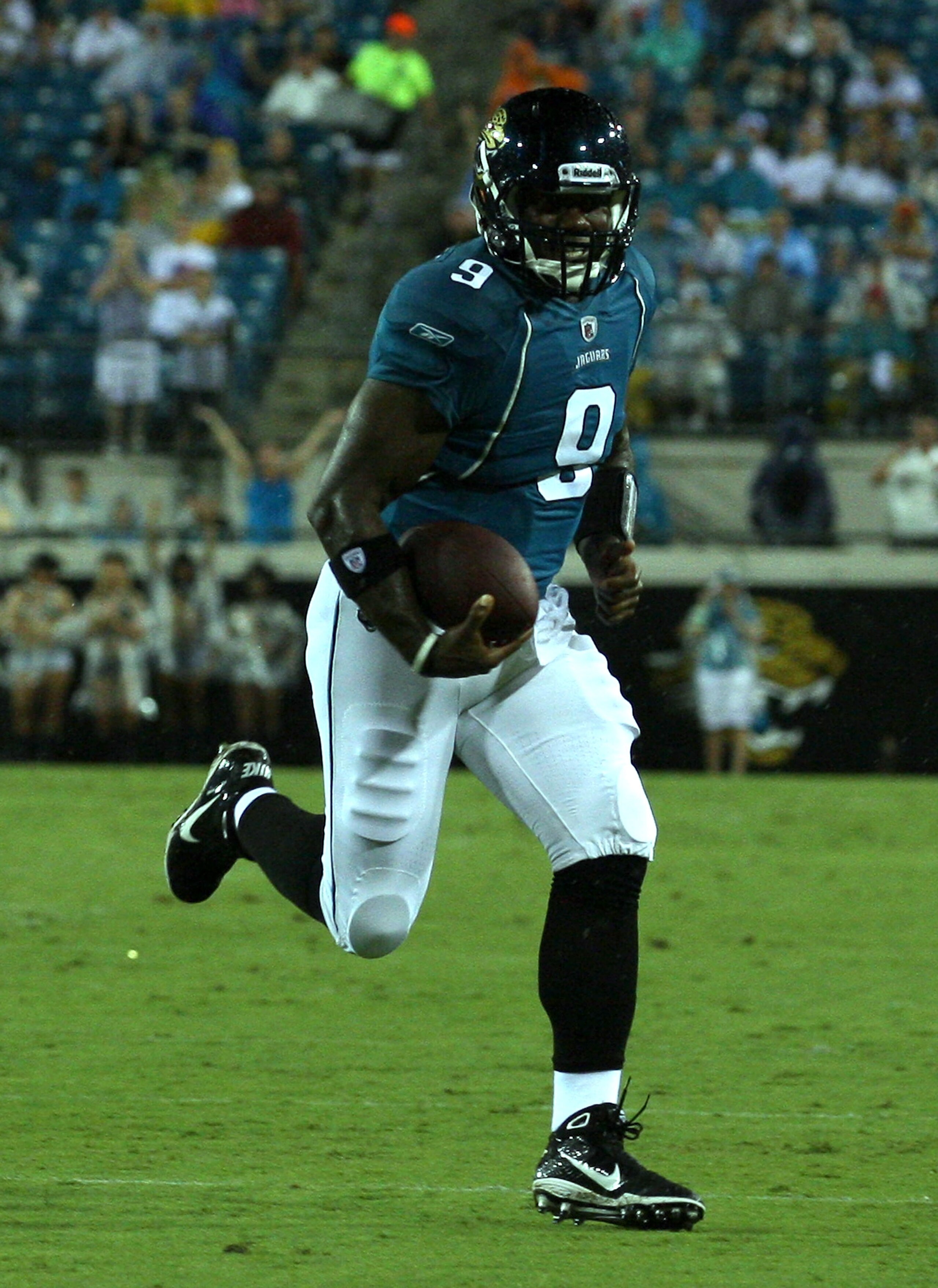 JACKSONVILLE, FL - AUGUST 21:  Quarterback David Garrard #9 of the Jacksonville Jaguars runs for yardage during the preseason game against the Miami Dolphins at EverBank Field on August 21, 2010 in Jacksonville, Florida.  (Photo by Sam Greenwood/Getty Ima