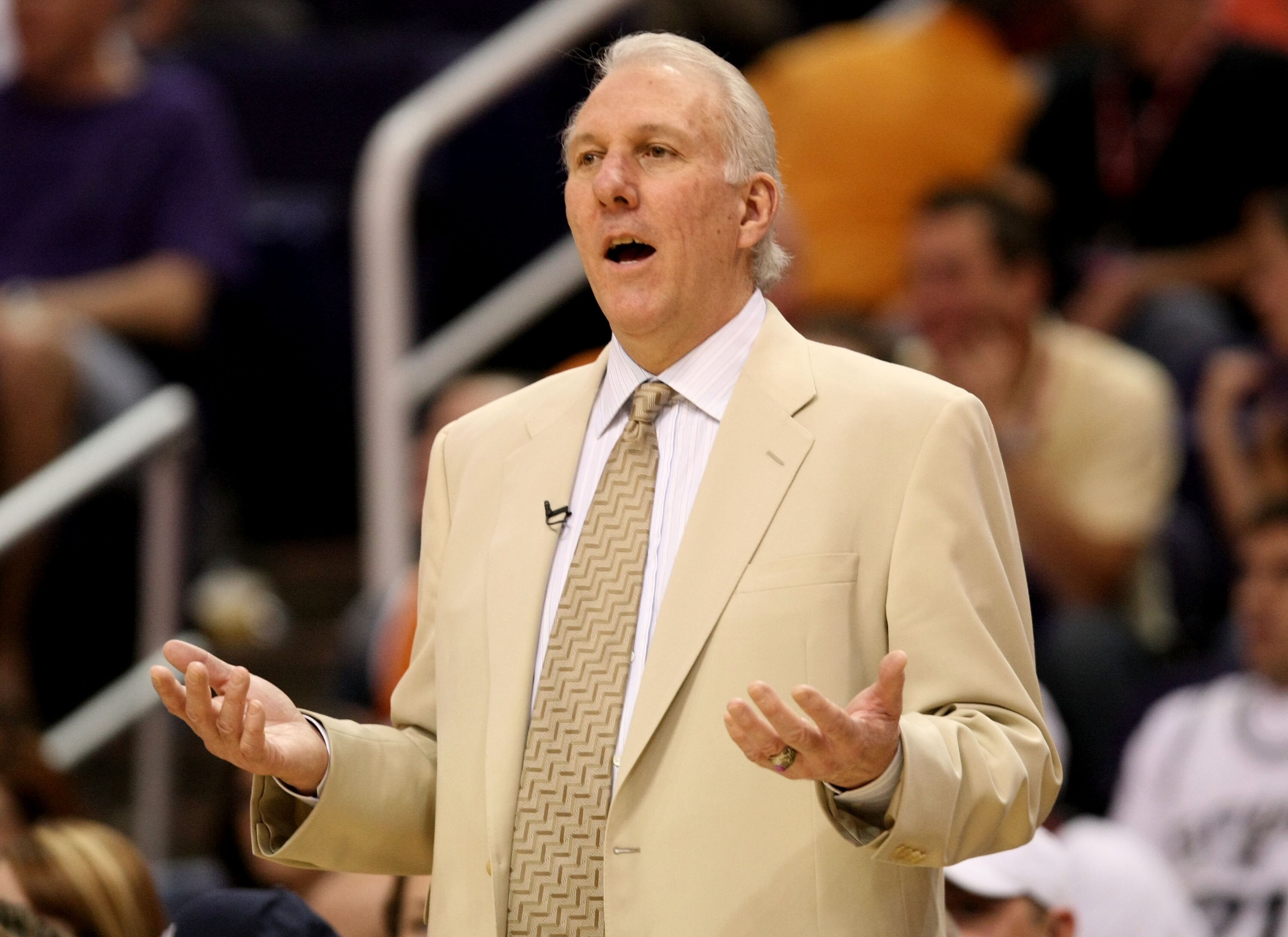PHOENIX - APRIL 27:  Head coach Gregg Popovich of the San Antonio Spurs reacts to a call against the Phoenix Suns during Game Four of the Western Conference Quarterfinals during the 2008 at NBA Playoffs at U.S. Airways Center April 27, 2008 in Phoenix, Ar