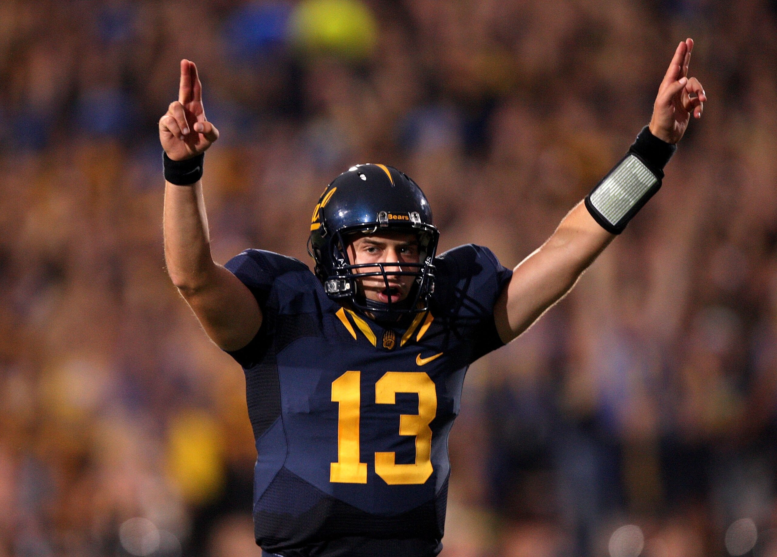 BERKELEY, CA - SEPTEMBER 05: Kevin Riley #13 of the California Golden Bears celebrates a touchdown by Jahvid Best that gave the Bear a 13-0 lead over the Maryland Terrapins at California Memorial Stadium on September 5, 2009 in Berkeley, California. (Ph BERKELEY, CA - SEPTEMBER 05: Kevin Riley #13 of the California Golden Bears celebrates a touchdown by Jahvid Best that gave the Bear a 13-0 lead over the Maryland Terrapins at California Memorial Stadium on September 5, 2009 in Berkeley, California. (Ph