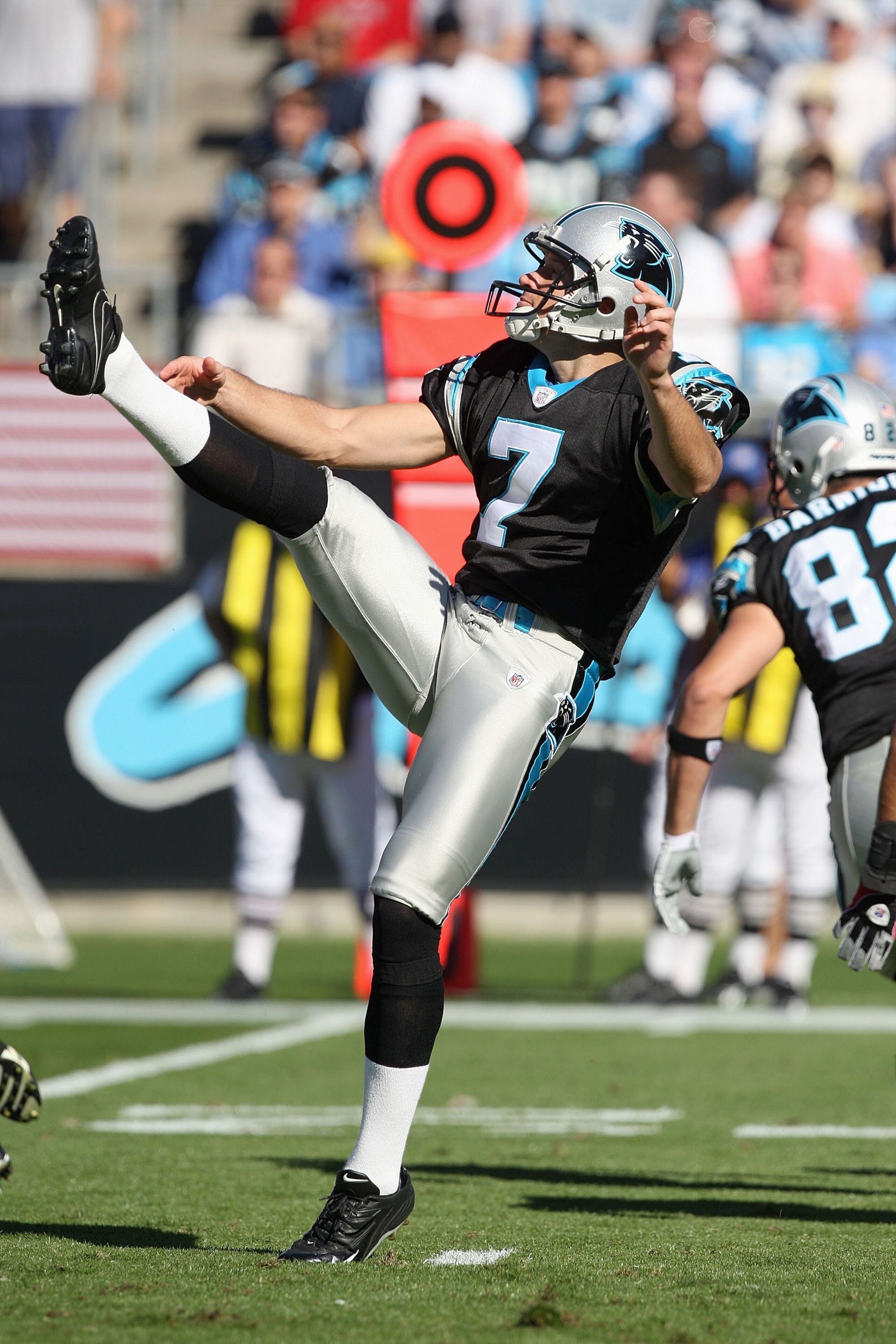 CHARLOTTE, NC - NOVEMBER 15:  Jason Baker #7 of the Carolina Panthers punts the ball during the game against the Atlanta Falcons at Bank of America Stadium on November 15, 2009 in Charlotte, North Carolina.  (Photo by Streeter Lecka/Getty Images)