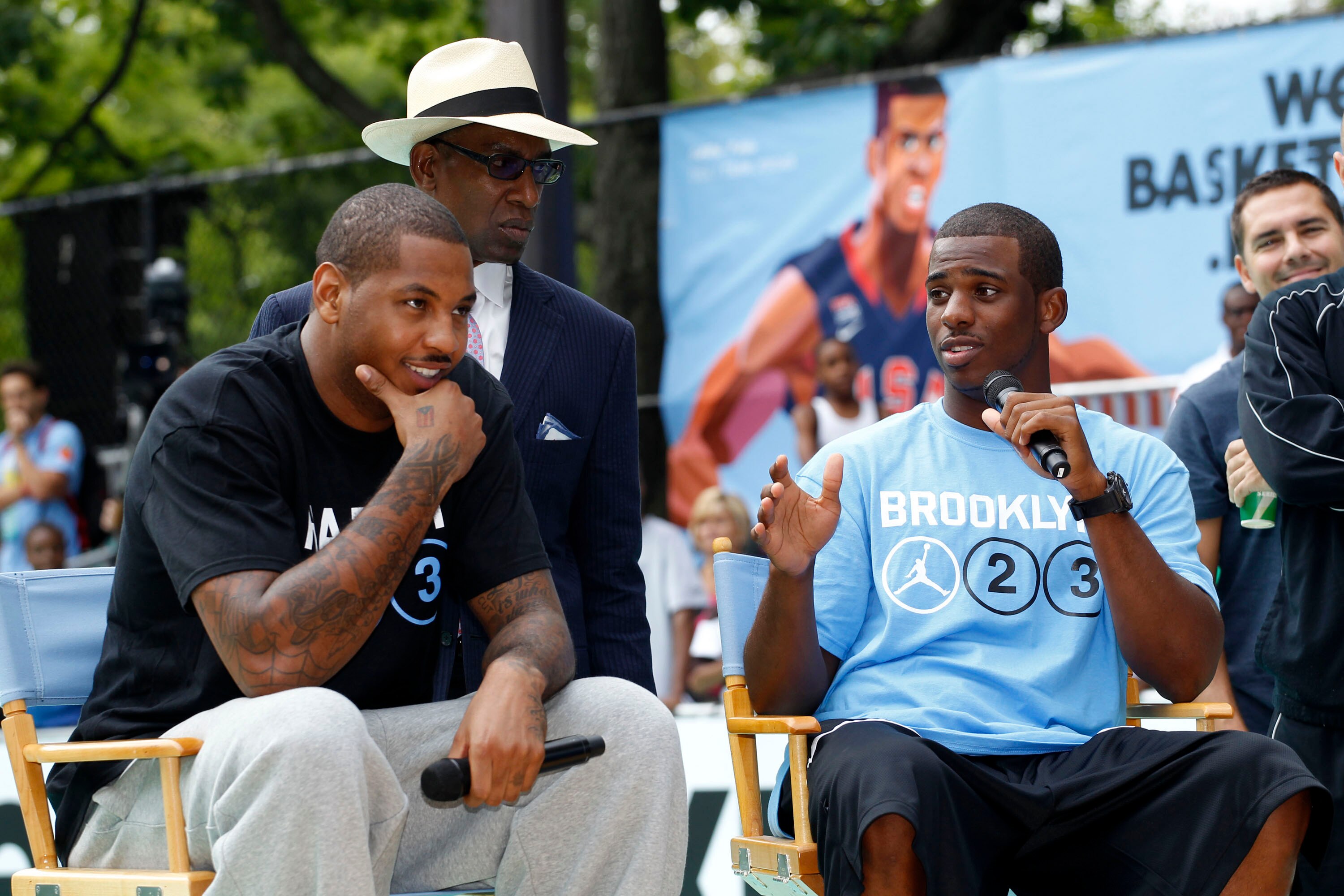 NEW YORK CITY, NY - AUGUST 13: Carmelo Anthony (L) and Chris Paul of USAB speak during the World Basketball Festival at Rucker Park on August 13, 2010 in New York City.  (Photo by Chris Trotman/Getty Images for Nike)