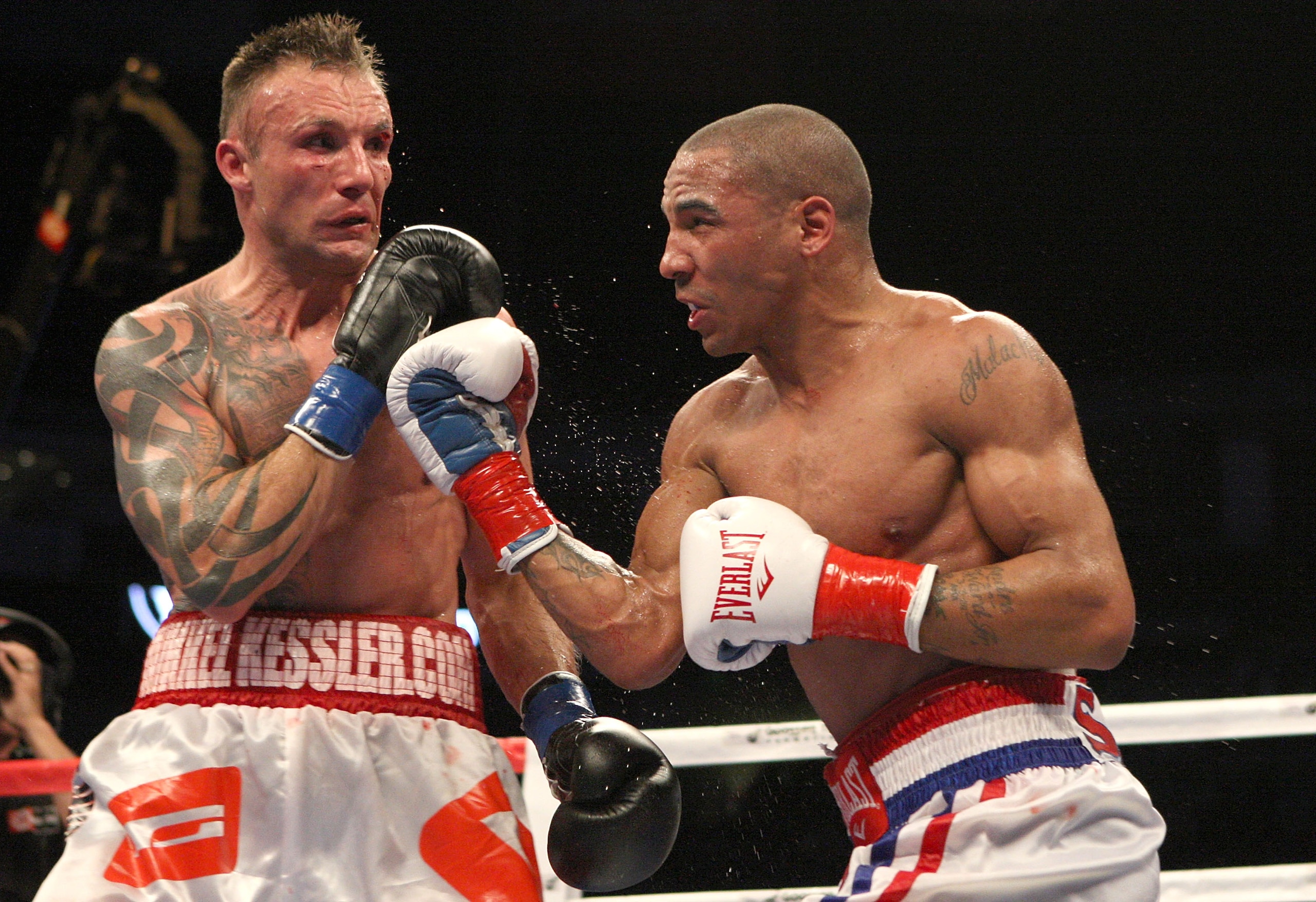 OAKLAND, CA - NOVEMBER 21:  Mikkel Kessler of Denmark (L) is hit by Andre Ward during their WBA Super Middleweight Championship Bout at the Oakland-Alameda County Coliseum on November 21, 2009 in Oakland, California.  (Photo by Jed Jacobsohn/Getty Images)