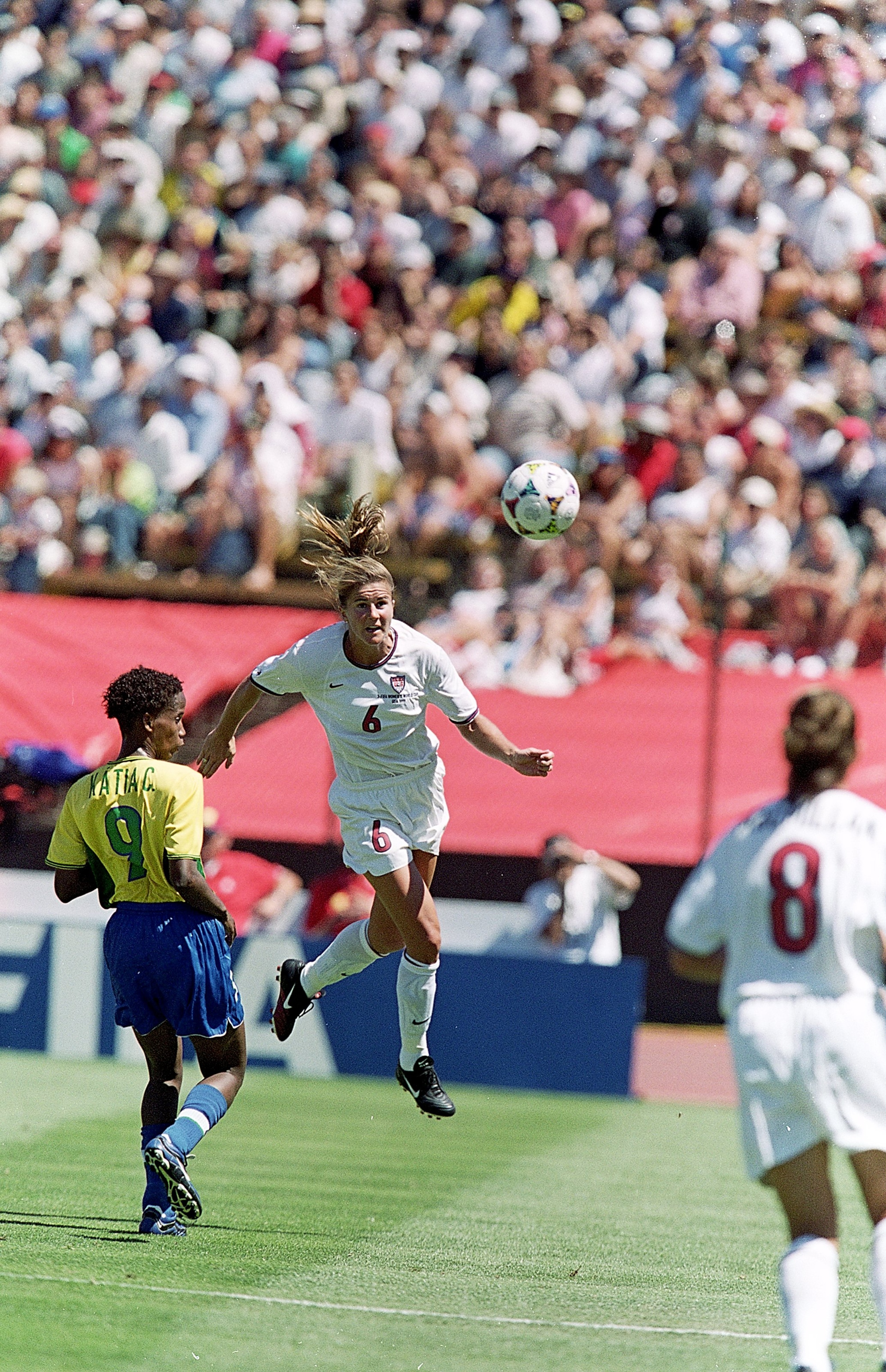 4 Jul 1999: Brandi Chastain #6 of Team USA jumps to head the ball during a Womens World Cup game against Team Brazil at the Stanford Stadium in Palo Alto, California. Team USA defeated Team Brazil 2-0. Mandatory Credit: Tom Hauck  /Allsport