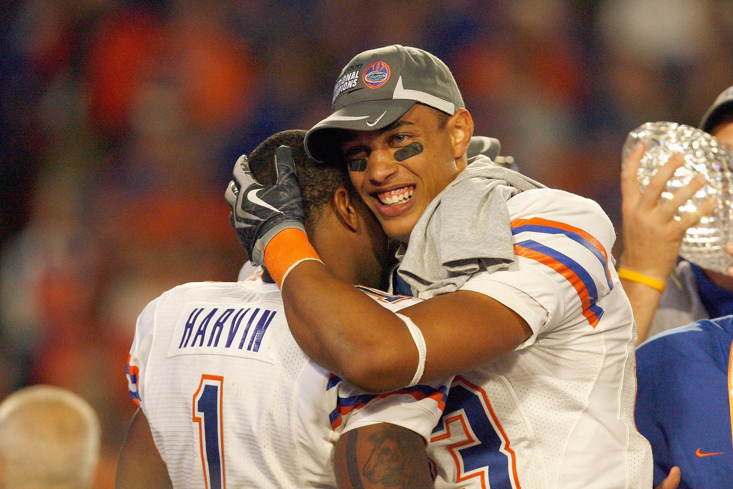 MIAMI - JANUARY 08: Quarterback Cameron Newton #13 and Percy Harvin #1 of the Florida Gators celebrate winning the FedEx BCS National Championship Game against the Oklahoma Sooners at Dolphin Stadium on January 8, 2009 in Miami, Florida. (Photo by Eliot MIAMI - JANUARY 08: Quarterback Cameron Newton #13 and Percy Harvin #1 of the Florida Gators celebrate winning the FedEx BCS National Championship Game against the Oklahoma Sooners at Dolphin Stadium on January 8, 2009 in Miami, Florida. (Photo by Eliot