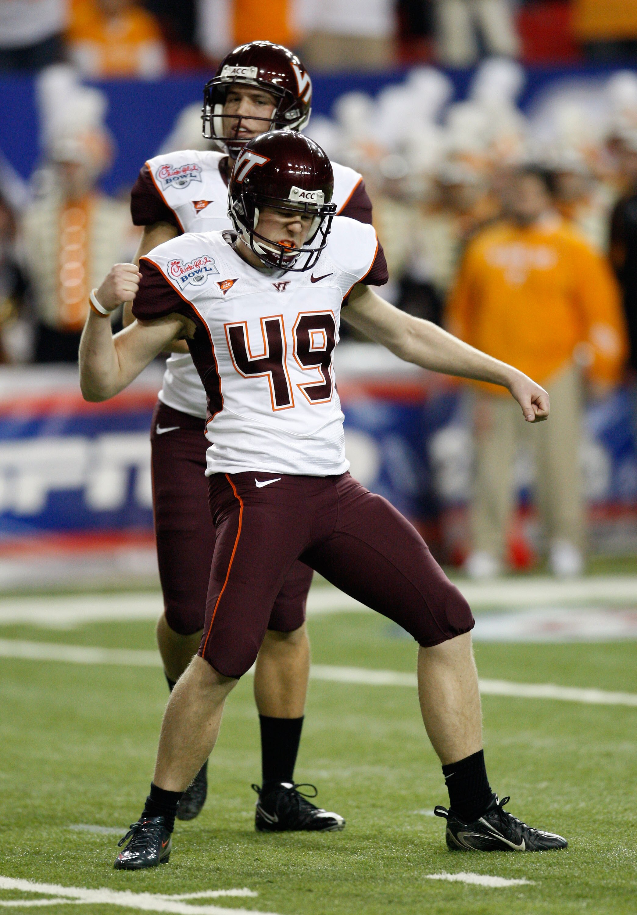 ATLANTA - DECEMBER 31:  Kicker Matt Waldron #49 of the Virginia Tech Hokies celebrates his late first half field goal during the Chick-Fil-A Bowl against the Virginia Tech Hokies at the Georgia Dome on December 31, 2009 in Atlanta, Georgia.  (Photo by Mik