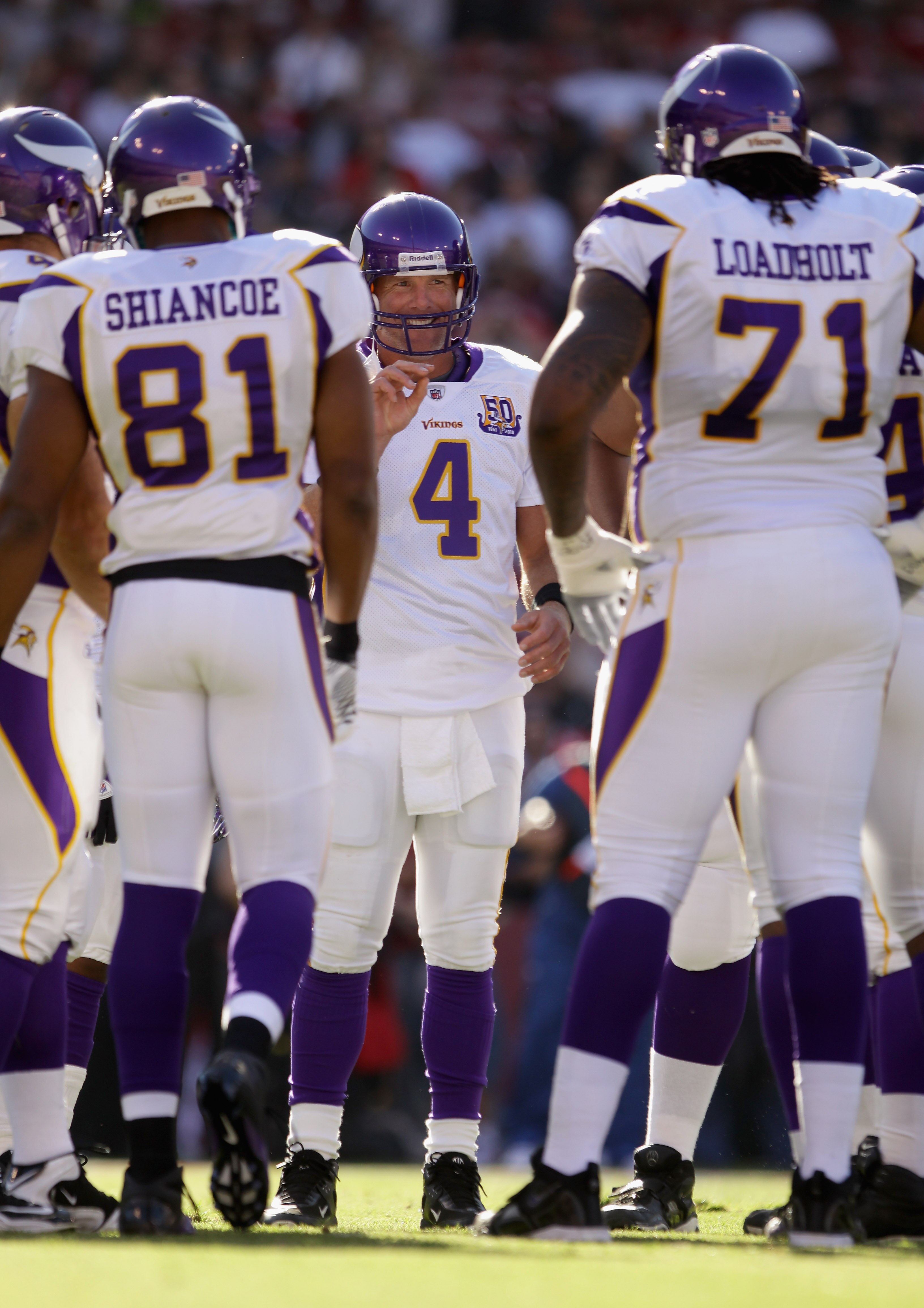 SAN FRANCISCO - AUGUST 22:  Brett Favre #4 of the Minnesota Vikings talks to his team in the huddle during their preseason game against the San Francisco 49ers at Candlestick Park on August 22, 2010 in San Francisco, California.  (Photo by Ezra Shaw/Getty