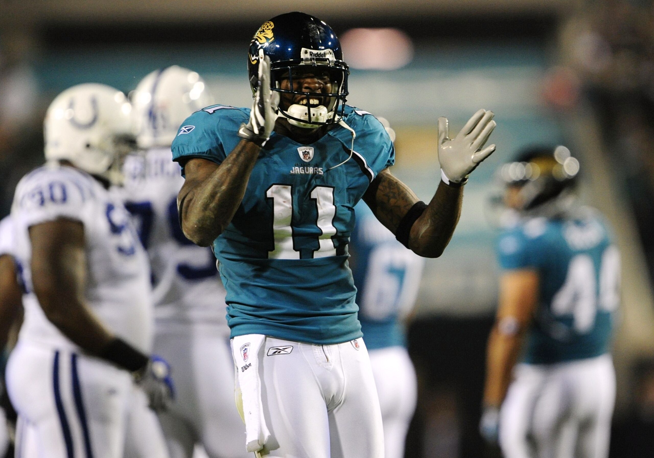JACKSONVILLE, FL - DECEMBER 17:  Mike Sims-Walker #11 of the Jacksonville Jaguarsreacts after he made a reception in the first half against the Indianapolis Colts at Jacksonville Municipal Stadium on December 17, 2009 in Jacksonville, Florida.  (Photo by