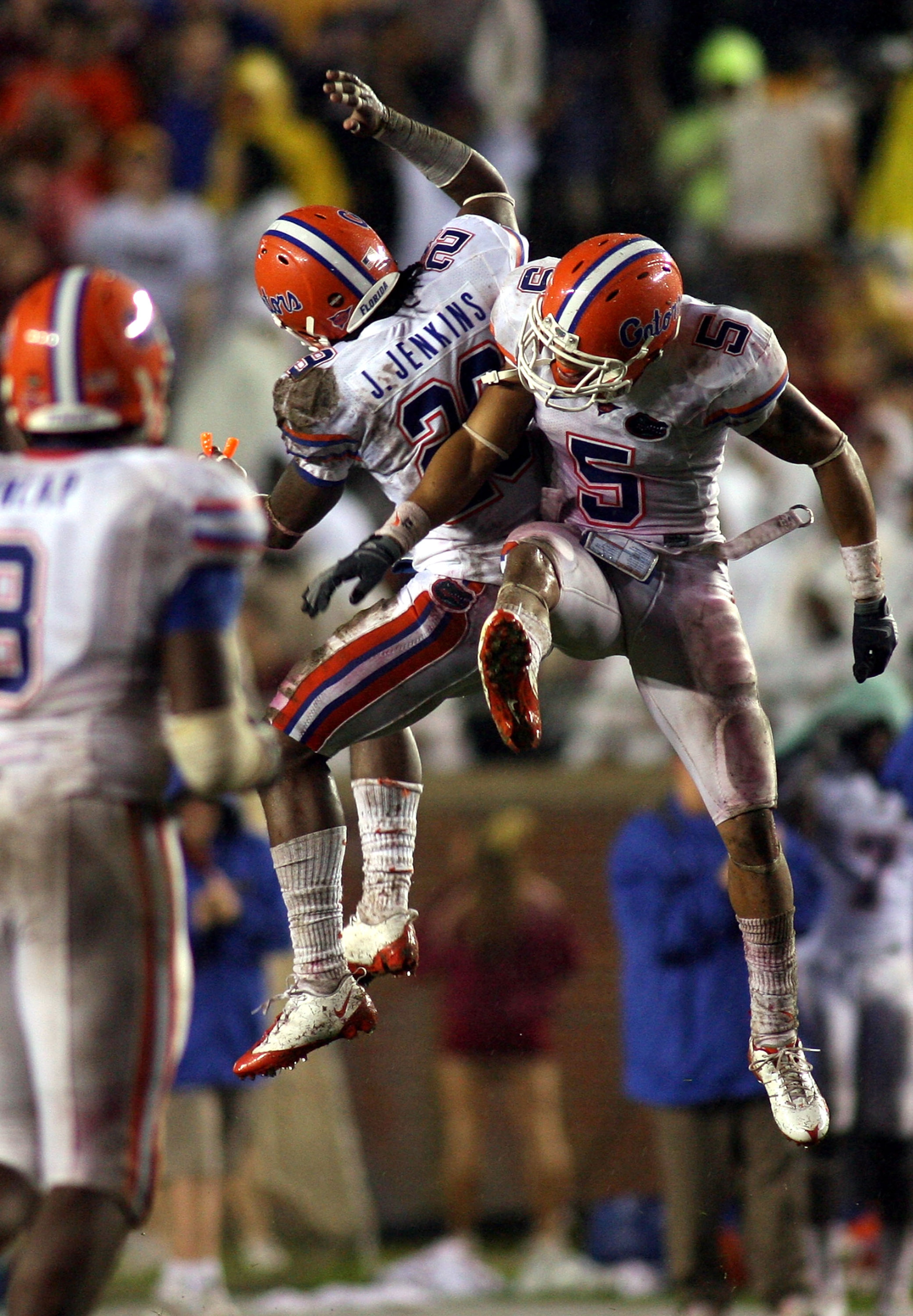 TALLAHASSEE, FL - NOVEMBER 29:  Cornerback Janoris Jenkins #29 of the Florida Gators celebrates his interception with teammate Joe Haden #5 against the Florida State Seminoles during the first half at Bobby Bowden Field at Doak Campbell Stadium on Novembe
