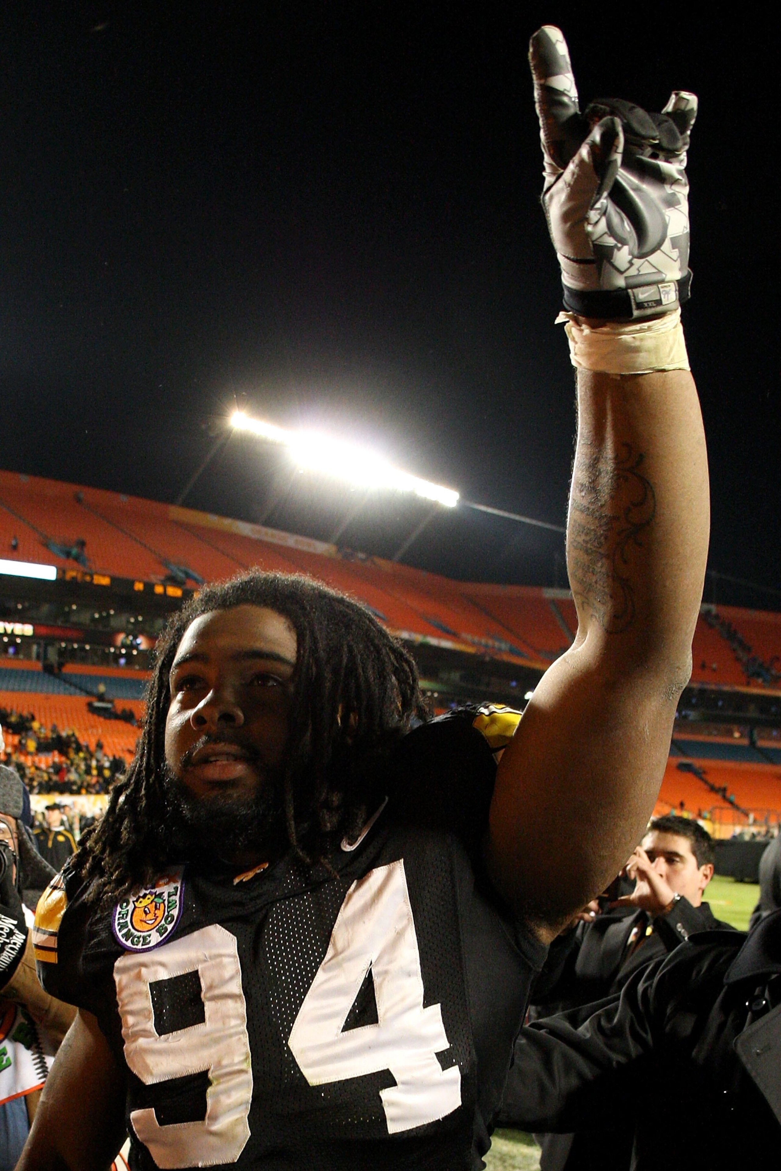 MIAMI GARDENS, FL - JANUARY 05:  Adrian Clayborn #94 of the Iowa Hawkeyes celebrates as he walks off the field after their 24-14 win against the Georgia Tech Yellow Jackets during the FedEx Orange Bowl at Land Shark Stadium on January 5, 2010 in Miami Gar