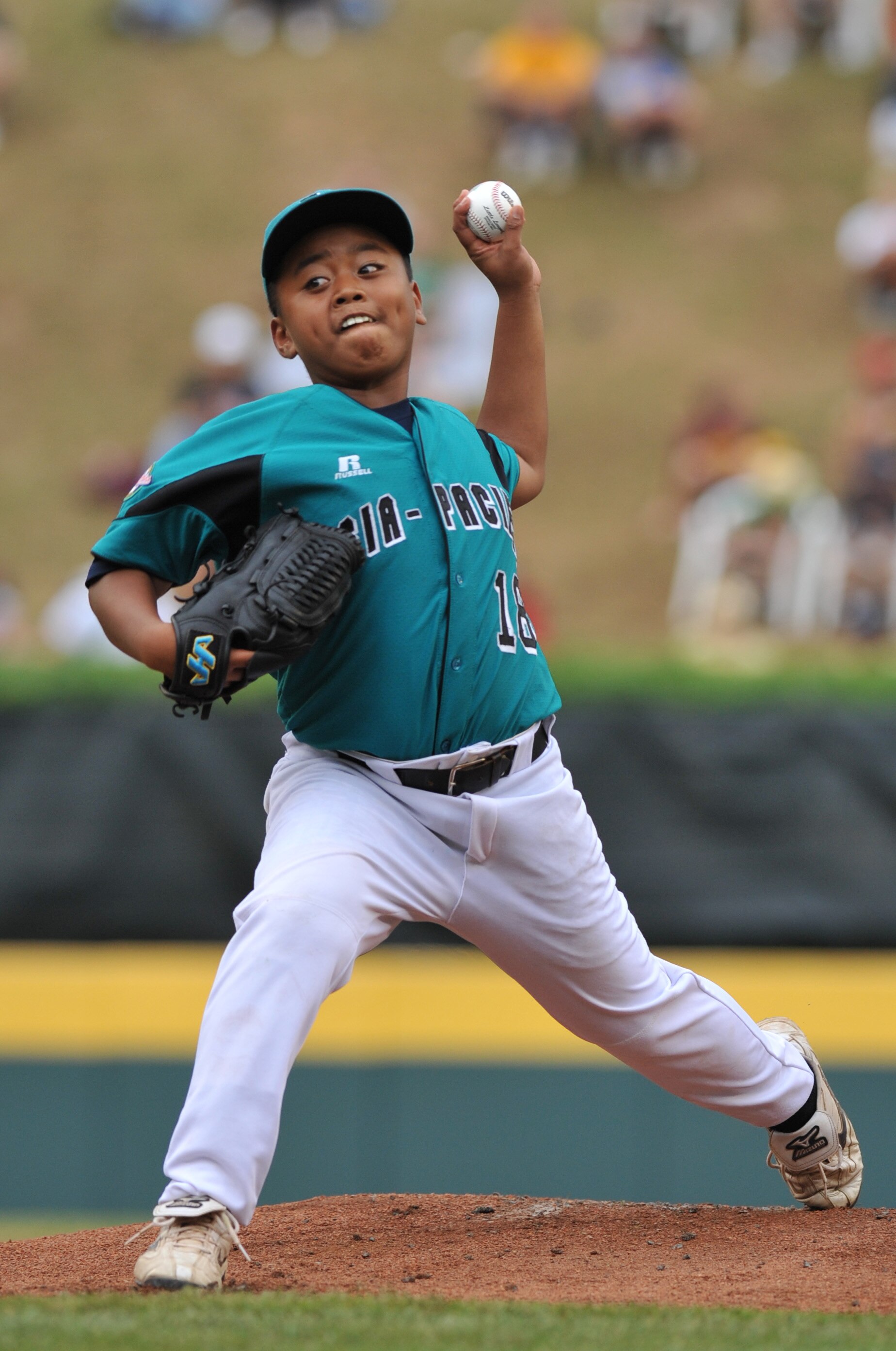 WILLIAMSPORT, PA - AUGUST 27: Starting pitcher Chin Ou #18 of Asia Pacific (Chinese Taipei) VERB against  the Caribbean (Curacao) in the international semifinal at Lamade Stadium on August 27, 2009 in Williamsport, Pennsylvania.  Asia Pacific (Chinese Tai