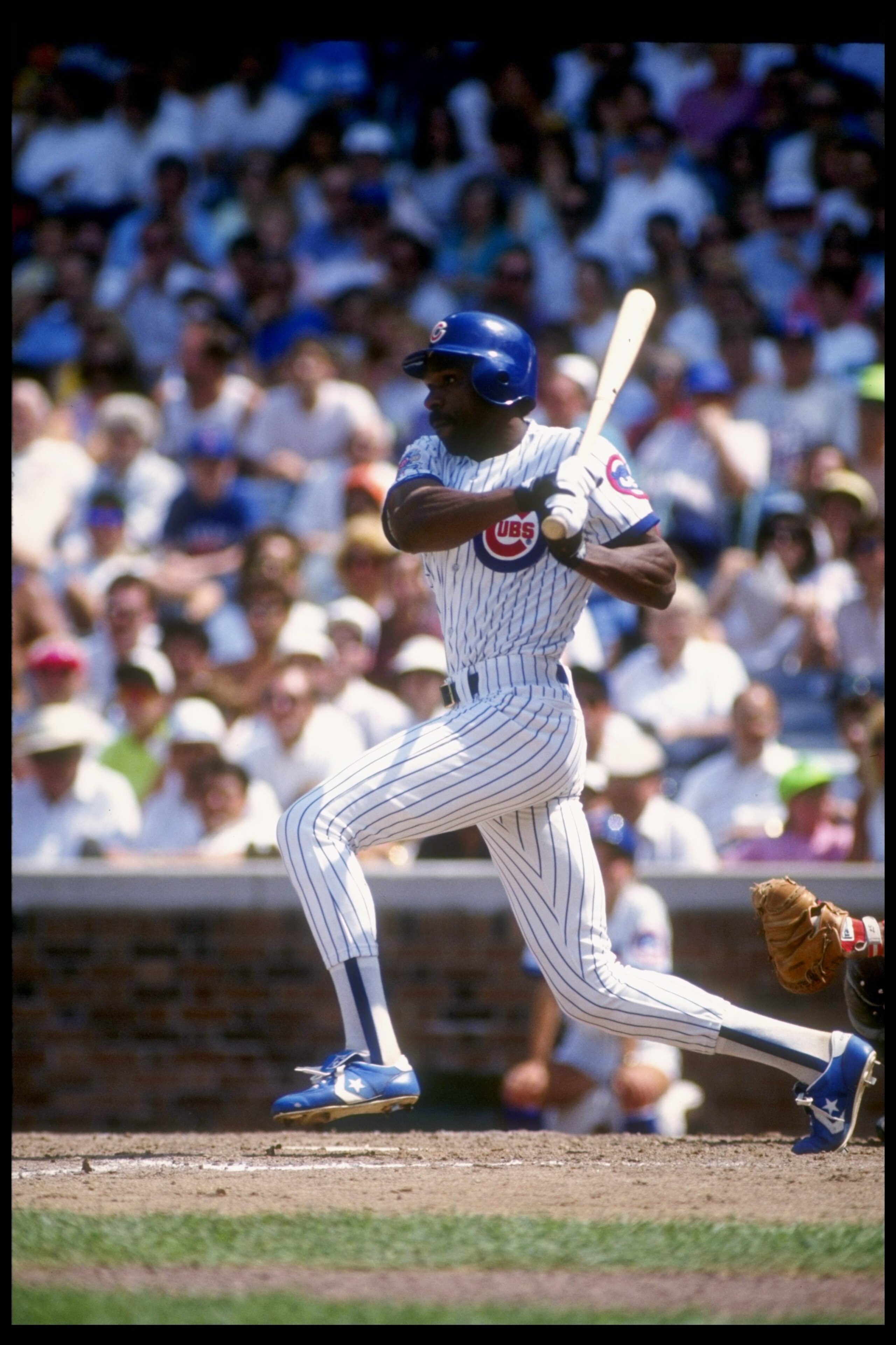 1990: Outfielder Andre Dawson of the Chicago Cubs swings at the ball during a game at Wrigley Field in Chicago, Illinois. Mandatory Credit: Jonathan Daniel /Allsport 1990: Outfielder Andre Dawson of the Chicago Cubs swings at the ball during a game at Wrigley Field in Chicago, Illinois. Mandatory Credit: Jonathan Daniel /Allsport