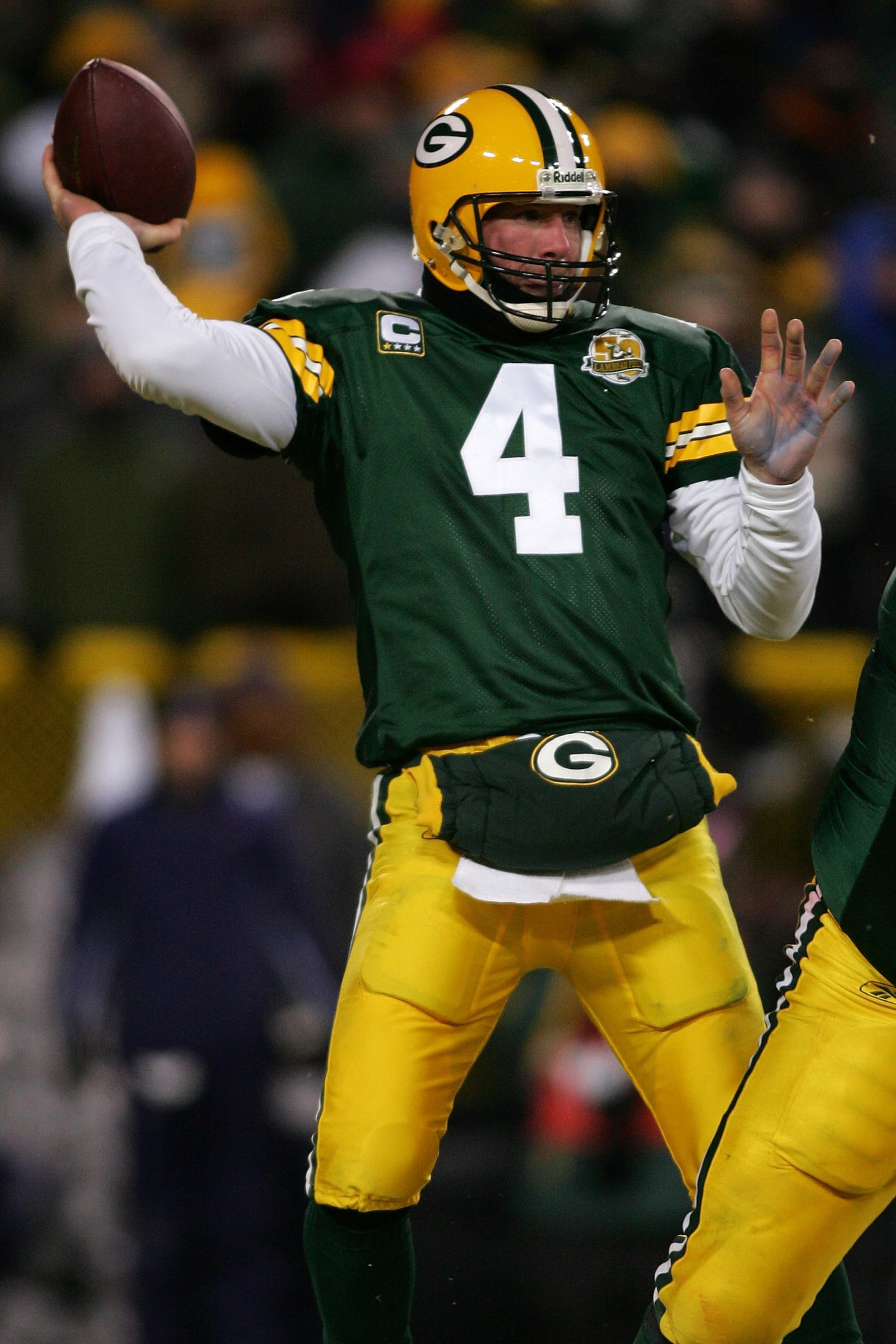 GREEN BAY, WI - JANUARY 20: Quarterback Brett Favre #4 of the Green Bay Packers throws the ball during the NFC championship game against the New York Giants on January 20, 2008 at Lambeau Field in Green Bay, Wisconsin. The Giants defeated the Packers 23- GREEN BAY, WI - JANUARY 20: Quarterback Brett Favre #4 of the Green Bay Packers throws the ball during the NFC championship game against the New York Giants on January 20, 2008 at Lambeau Field in Green Bay, Wisconsin. The Giants defeated the Packers 23-