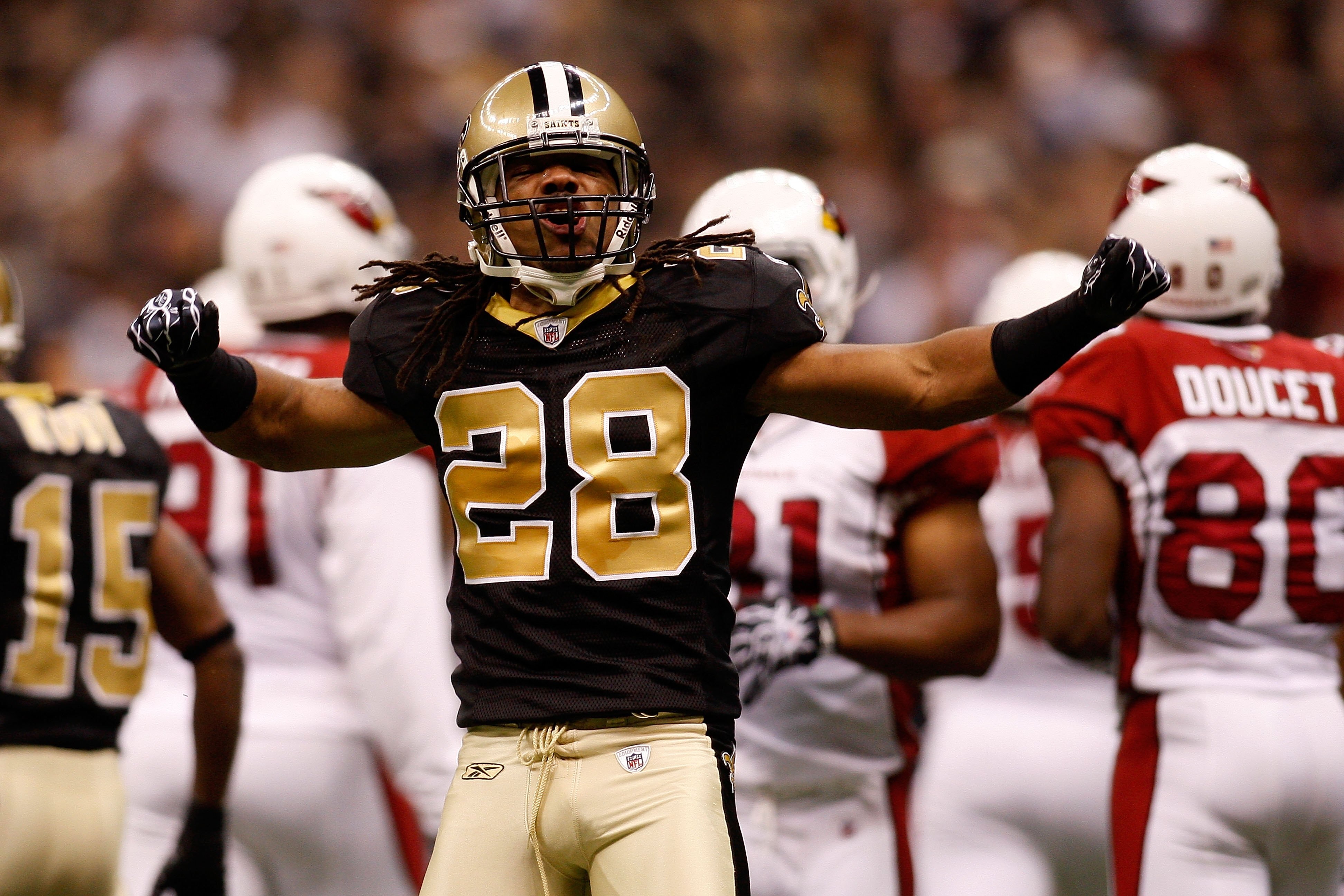 NEW ORLEANS - JANUARY 16:  Usama Young #28 of the New Orleans Saints reacts against the Arizona Cardinals during the NFC Divisional Playoff Game at Louisana Superdome on January 16, 2010 in New Orleans, Louisiana.  (Photo by Chris Graythen/Getty Images)