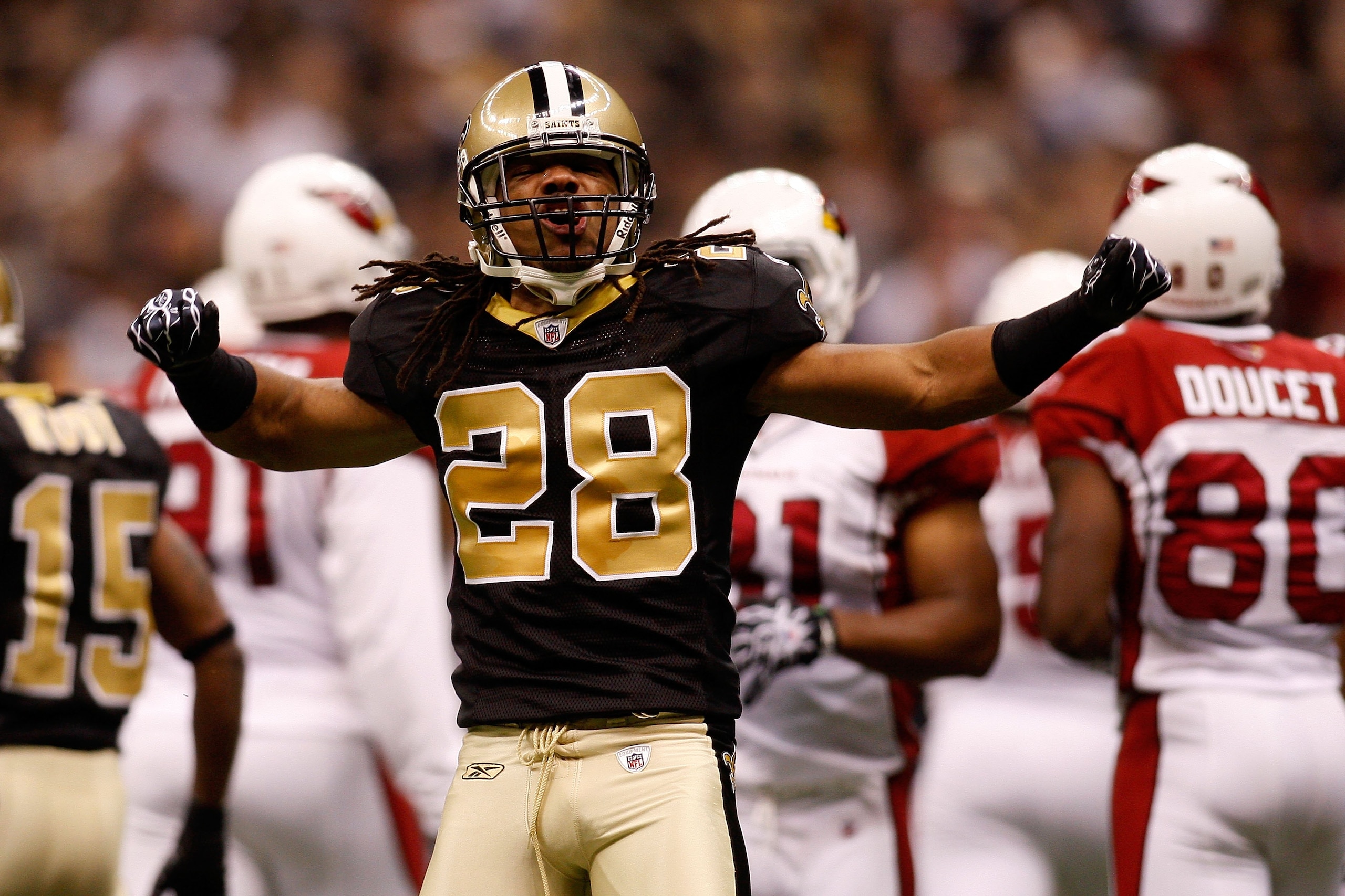 NEW ORLEANS - JANUARY 16:  Usama Young #28 of the New Orleans Saints reacts against the Arizona Cardinals during the NFC Divisional Playoff Game at Louisana Superdome on January 16, 2010 in New Orleans, Louisiana.  (Photo by Chris Graythen/Getty Images)