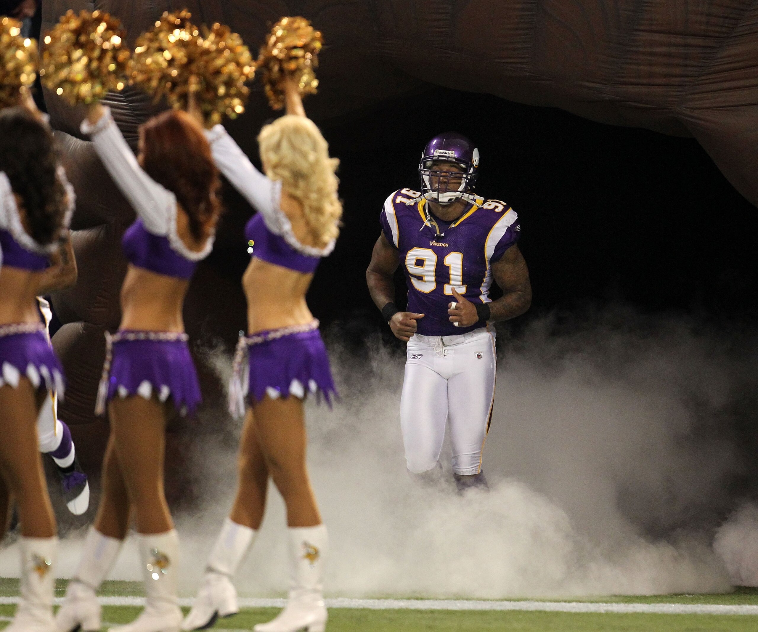 MINNEAPOLIS - JANUARY 17:  Defensive end Ray Edwards #91 of the Minnesota Vikings enters the field before the game against the Dallas Cowboys during the NFC Divisional Playoff Game at Hubert H. Humphrey Metrodome on January 17, 2010 in Minneapolis, Minnes
