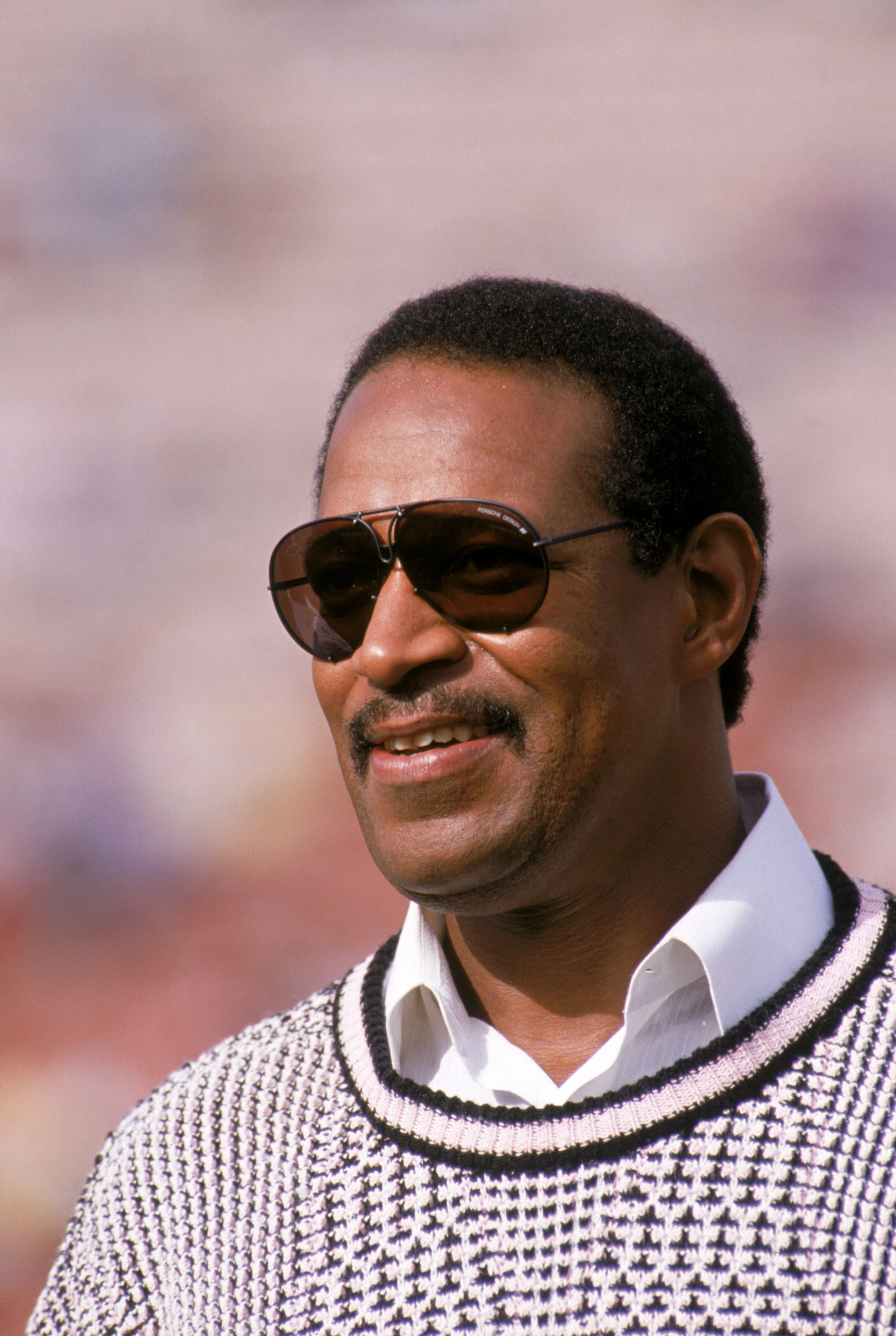 LOS ANGELES - DECEMBER 4:  Hall of Famer and former Raiders guard, Gene Upshaw, attends a game between the Denver Broncos and the Los Angeles Raiders at the Los Angeles Memorial Coliseum on December 4, 1988 in Los Angeles, California.  The Raiders won 21-