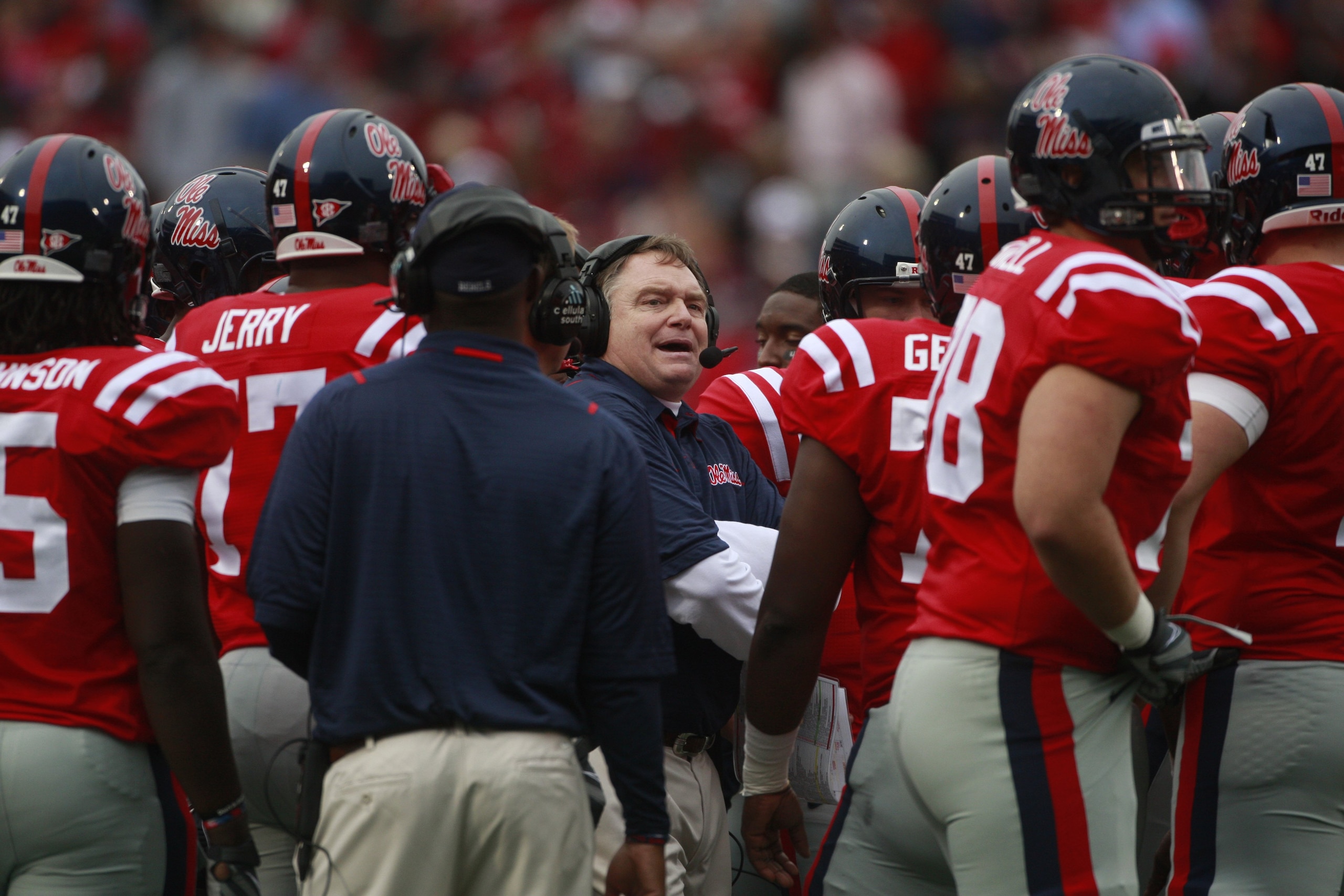 OXFORD, MS - OCTOBER 10: Coach Houston Nutt of the Mississippi Rebels talks with his offense during their game with the Alabama Crimson Tide at Vaught-Hemingway Stadium on October 10, 2009 in Oxford, Mississippi. (Photo by Dave Martin/Getty Images) OXFORD, MS - OCTOBER 10: Coach Houston Nutt of the Mississippi Rebels talks with his offense during their game with the Alabama Crimson Tide at Vaught-Hemingway Stadium on October 10, 2009 in Oxford, Mississippi. (Photo by Dave Martin/Getty Images)