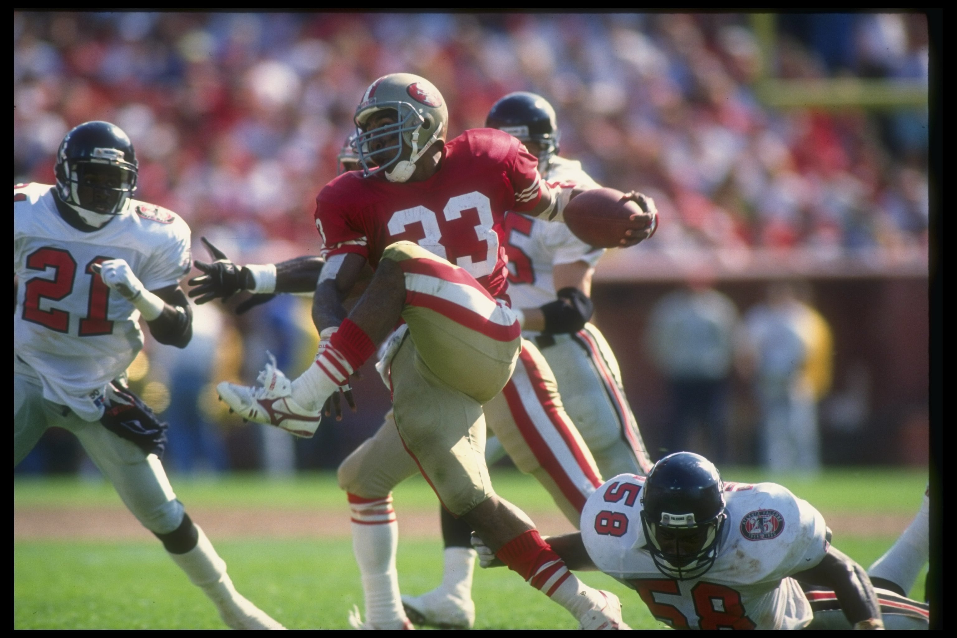 23 Sep 1990:  Running back Roger Craig of the San Francisco 49ers runs with the ball during a game against the Atlanta Falcons at Candlestick Park in San Francisco, California.  The 49ers won the game, 19-13. Mandatory Credit: Otto Greule  /Allsport