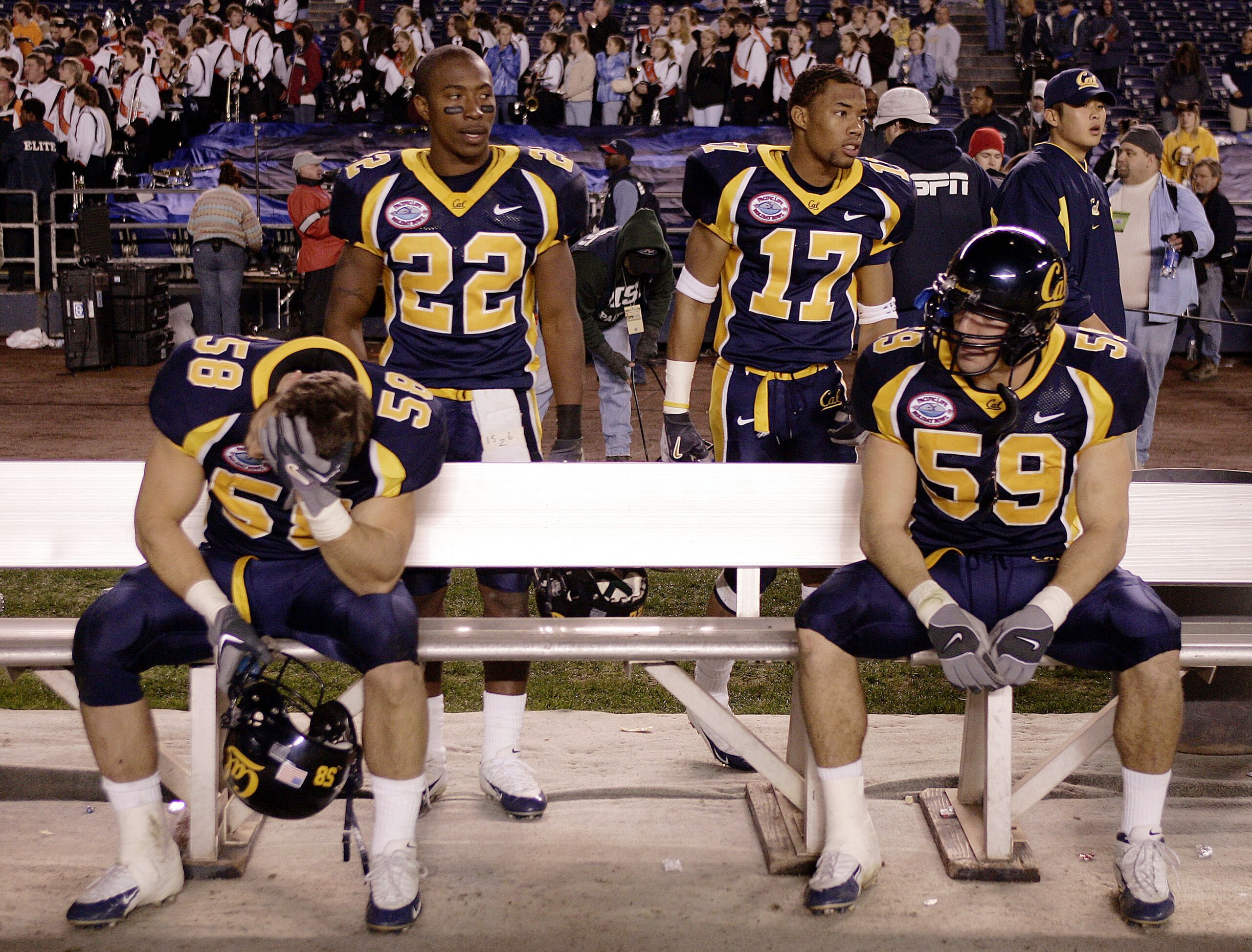 SAN DIEGO, CA - DECEMBER 30:  Linebacker Brian Tremblay #58, cornerbacks Tim Mixon #22, Randy Bundy #17, and linebacker Sid Slater #59 of the California Golden Bears appear dejected after their team's 45-31 loss to the Texas Tech Red Raiders in the Pacifi
