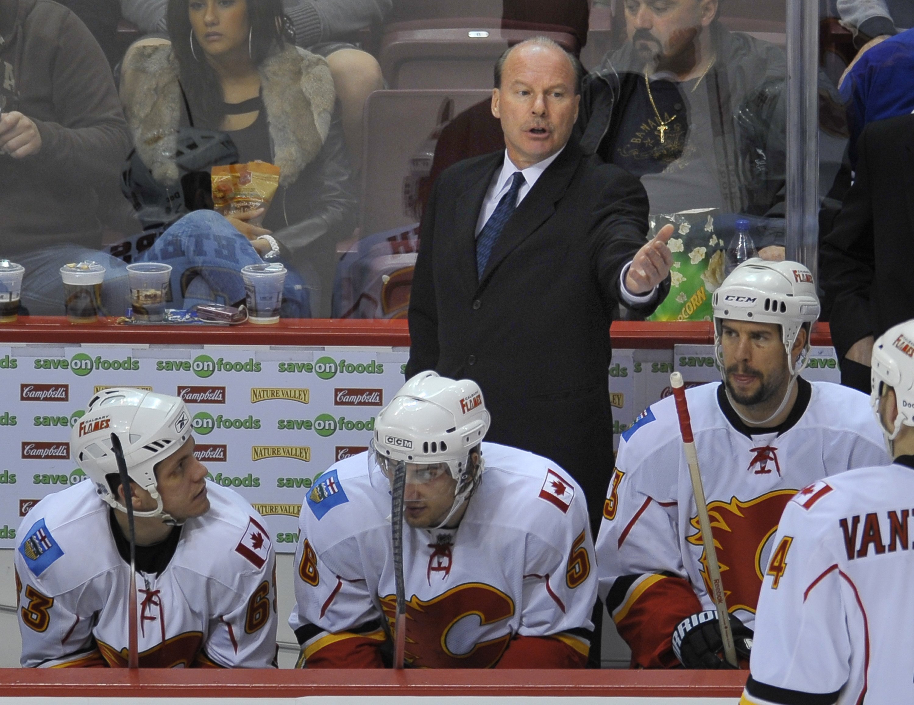 VANCOUVER, CANADA - APRIL 7: Calgary Flames Head Coach Mike Keenan instructs a player during their game against the Vancouver Canucks at General Motors Place April 7, 2009 in Vancouver, Canada.   (Photo by Nick Didlick/Getty Images)