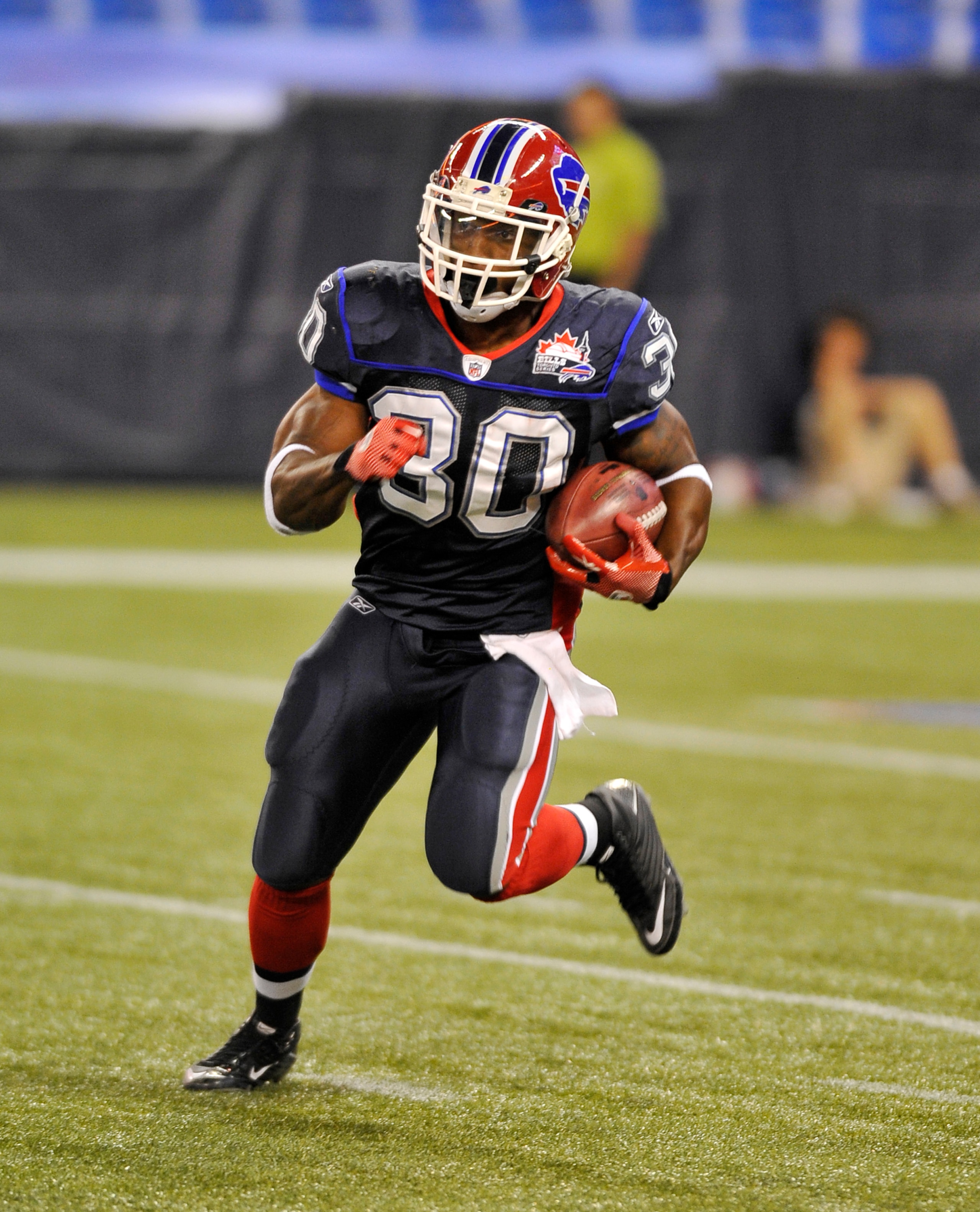 TORONTO, CANADA - AUGUST 19: Chad Simpson #30 of the Buffalo Bills runs with the ball during game action against the Indianapolis Colts on August 19, 2010 at the Rogers Centre in Toronto, Ontario, Canada. (Photo by Brad White/Getty Images)