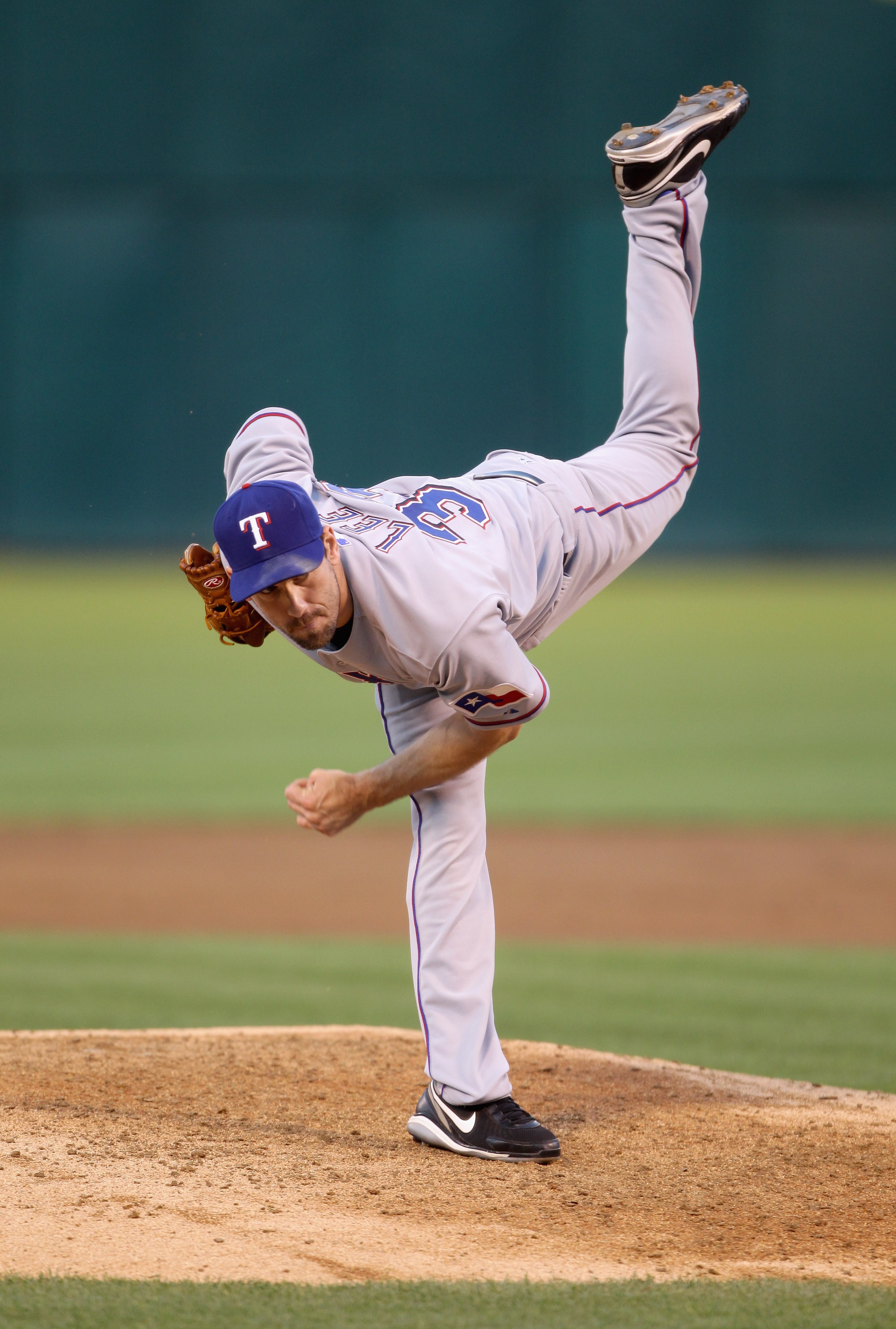 OAKLAND, CA - AUGUST 06:  Cliff Lee #33 of the Texas Rangers pitches against the Oakland Athletics at the Oakland-Alameda County Coliseum on August 6, 2010 in Oakland, California.  (Photo by Ezra Shaw/Getty Images)