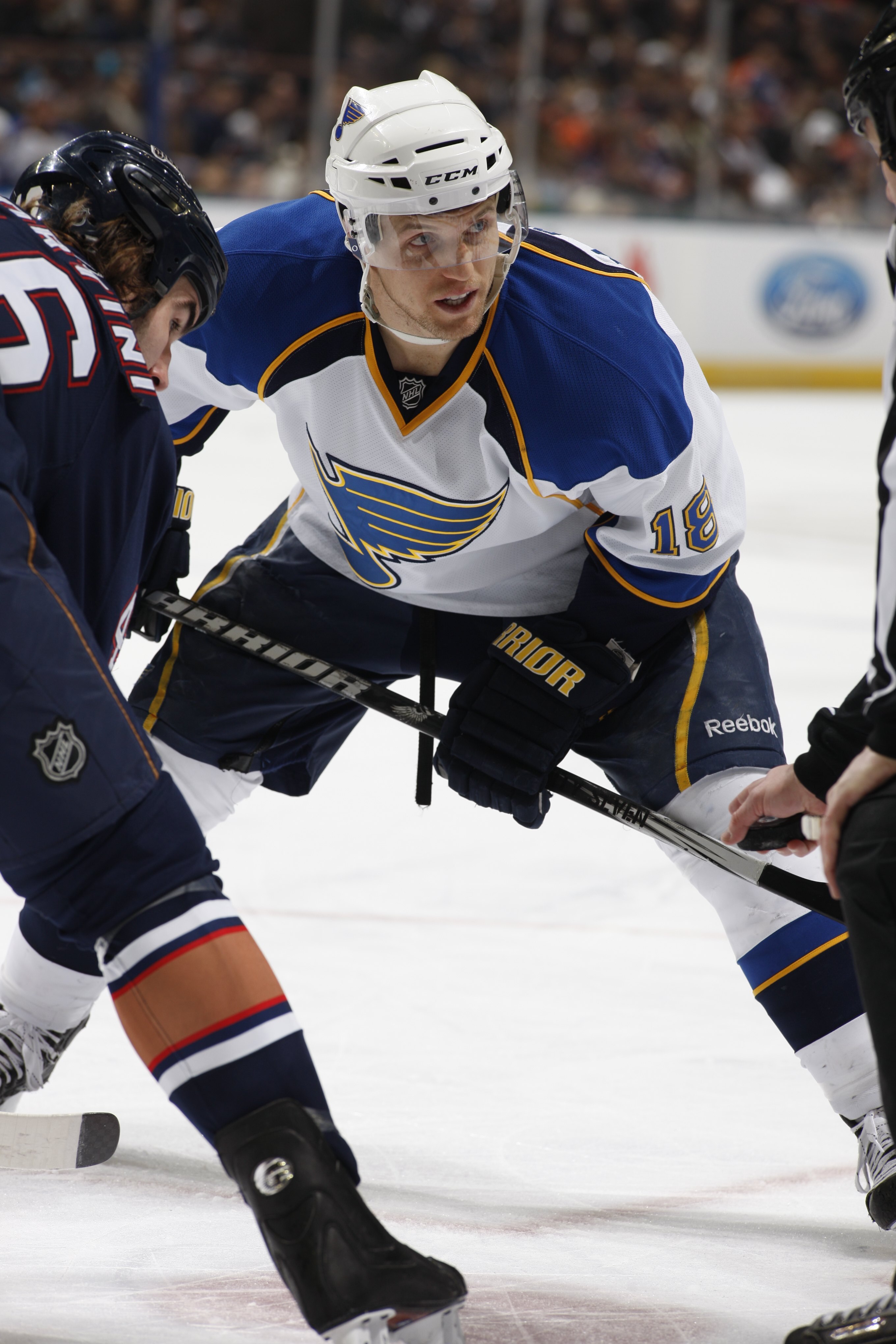 EDMONTON, CANADA - DECEMBER 21:  Jay McClement #18 of the St. Louis Blues looks to the linesman prior to taking the faceoff against Zack Stortini #46 of the Edmonton Oilers during their NHL game on December 21, 2009 at Rexall Place in Edmonton, Alberta, C