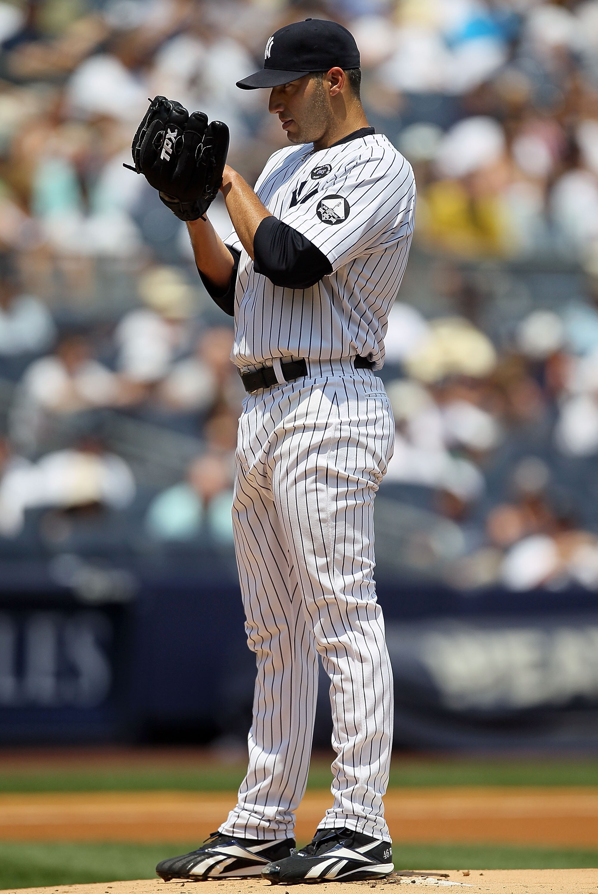 NEW YORK - JULY 18:  Andy Pettitte #46 of the New York Yankees delivers a pitch against the Tampa Bay Rays on July 18, 2010 at Yankee Stadium in the Bronx borough of New York City.  (Photo by Jim McIsaac/Getty Images)