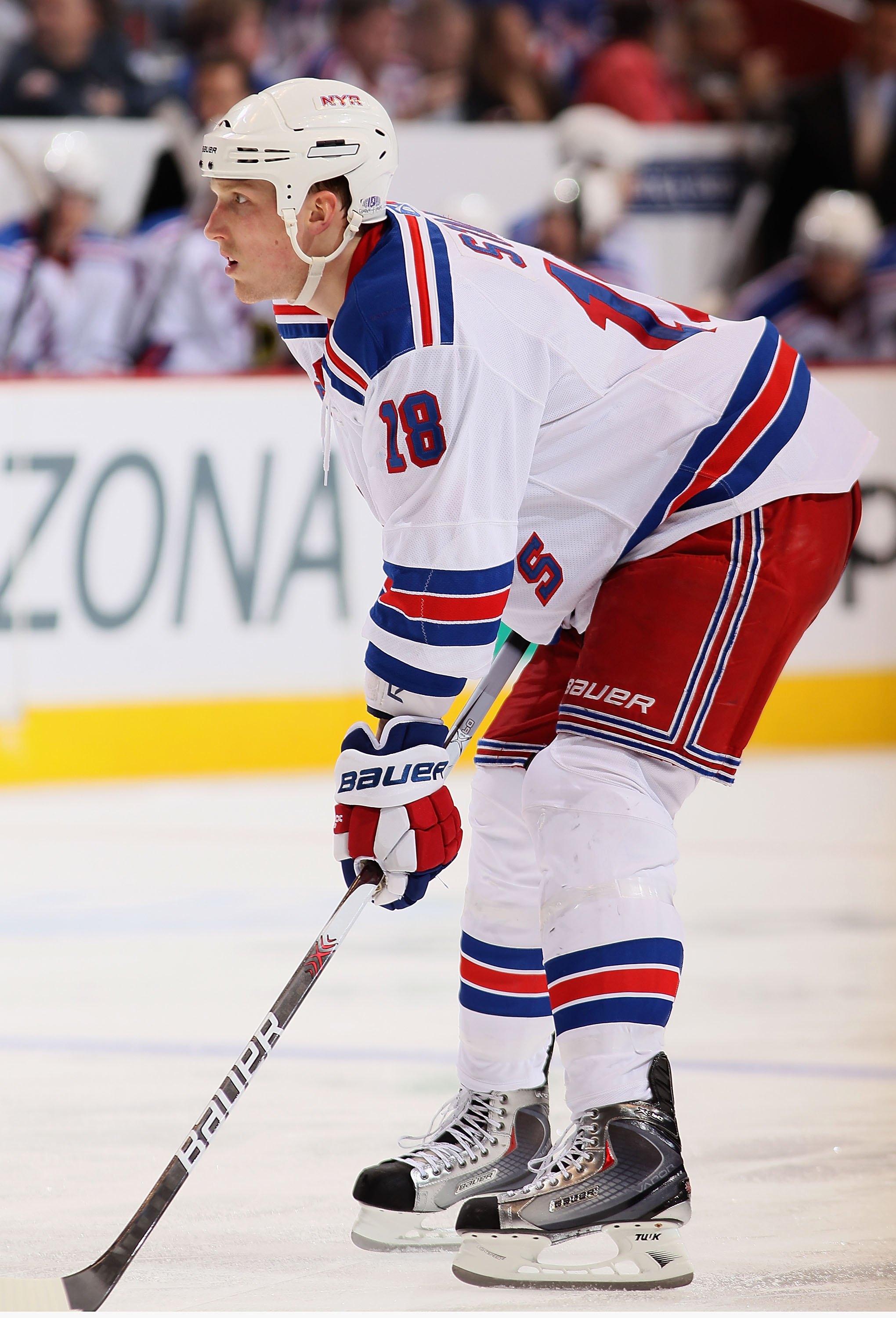 GLENDALE, AZ - JANUARY 30:  Marc Staal #18 of the New York Rangers leans in for a face off during the NHL game against the Phoenix Coyotes at Jobing.com Arena on January 30, 2010 in Glendale, Arizona.  The Coyotes defeated the Rangers 3-2.  (Photo by Chri